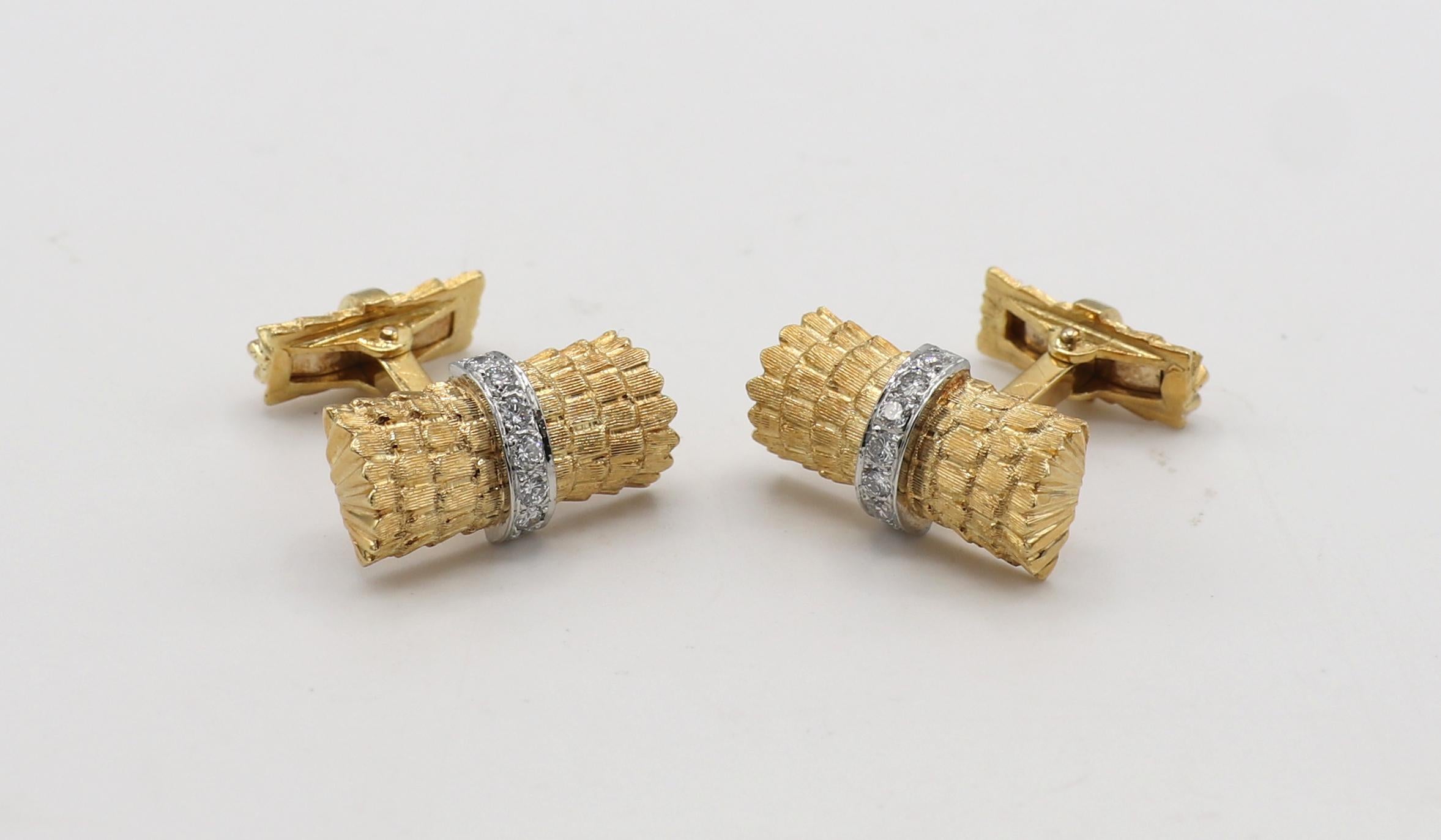 Tiffany & Co. 18 Karat Gold & Diamond Cufflinks 
Metal: 18k yellow gold
Weight: 16.89 grams
Diamonds: Approx. .42 CTW G-H VS round diamonds
Length: 20mm
Width: 10.3mm
