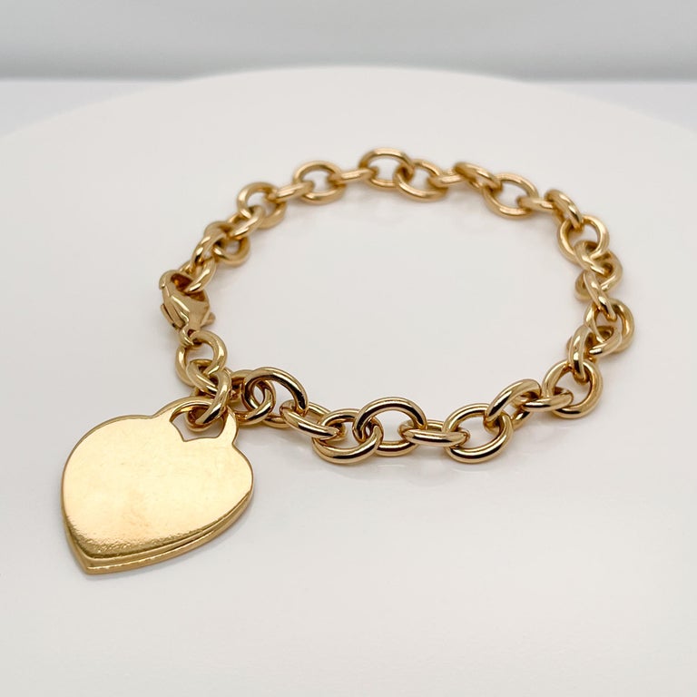 Tiffany and Co. 18 Karat Gold Dog Chain Link Bracelet and Heart Charm For  Sale at 1stDibs | tiffany 18k gold charm, tiffany bracelet, gold bracelet  tiffany