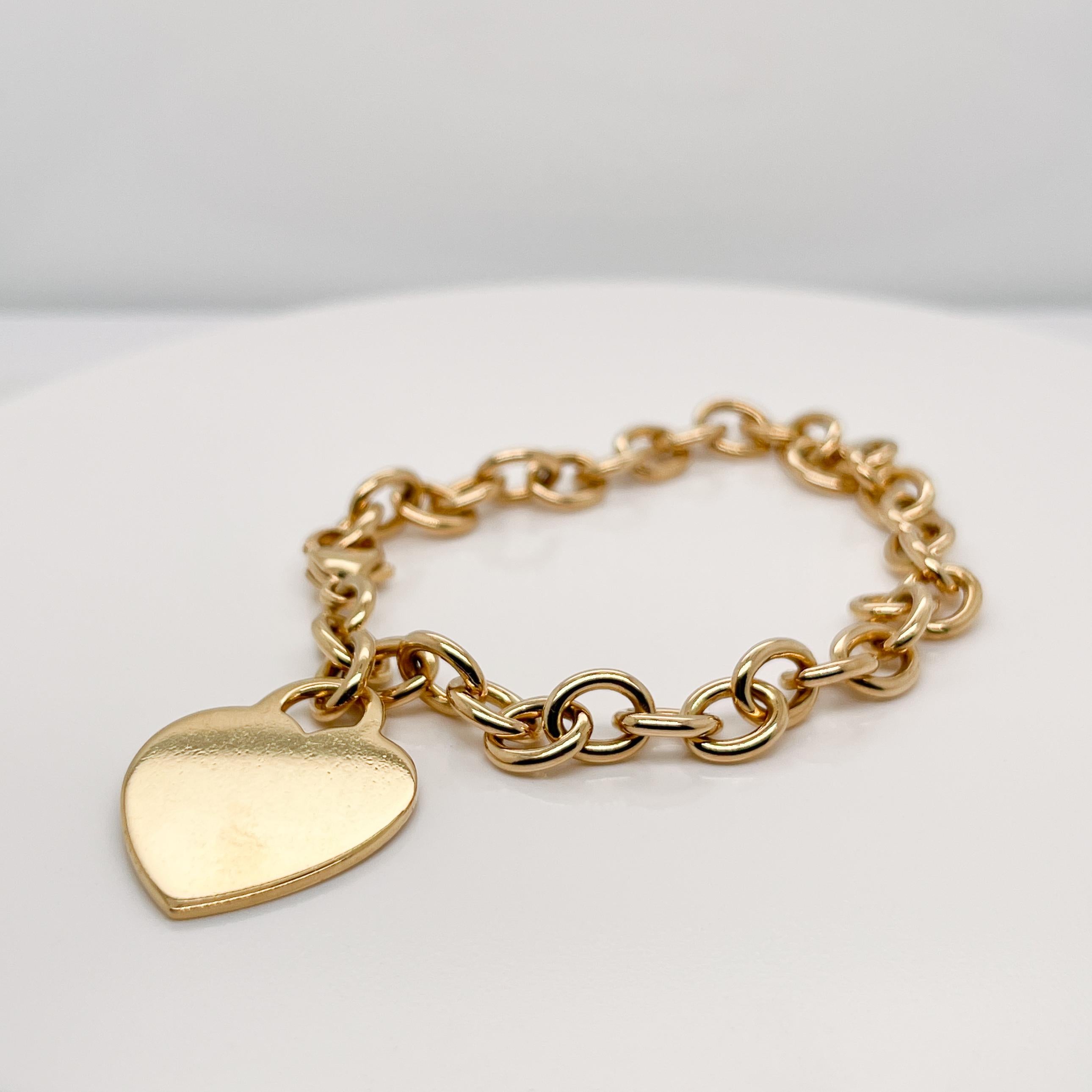 Tiffany & Co. 18 Karat Gold Dog Chain Link Bracelet & Heart Charm For Sale 1