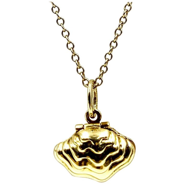 Tiffany and Co. 18 Karat Gold, Enamel, Cultured Pearl Oyster Pendant Charm,  2001 at 1stDibs | gold oyster charm, gold oyster necklace, gold pearls clam