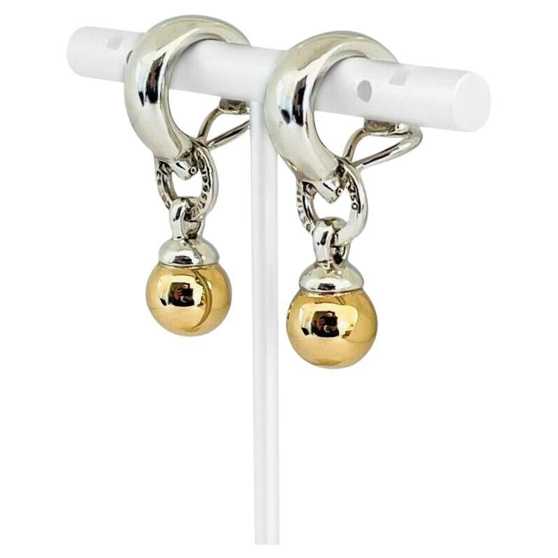 Tiffany 
Co. Clips d
oreilles boules Fascination en or 18 carats et argent sterling