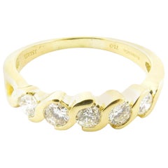 Tiffany & Co. 18 Karat Gold Swirl Semi Bezel Set Diamond Band Ring .50 Carat