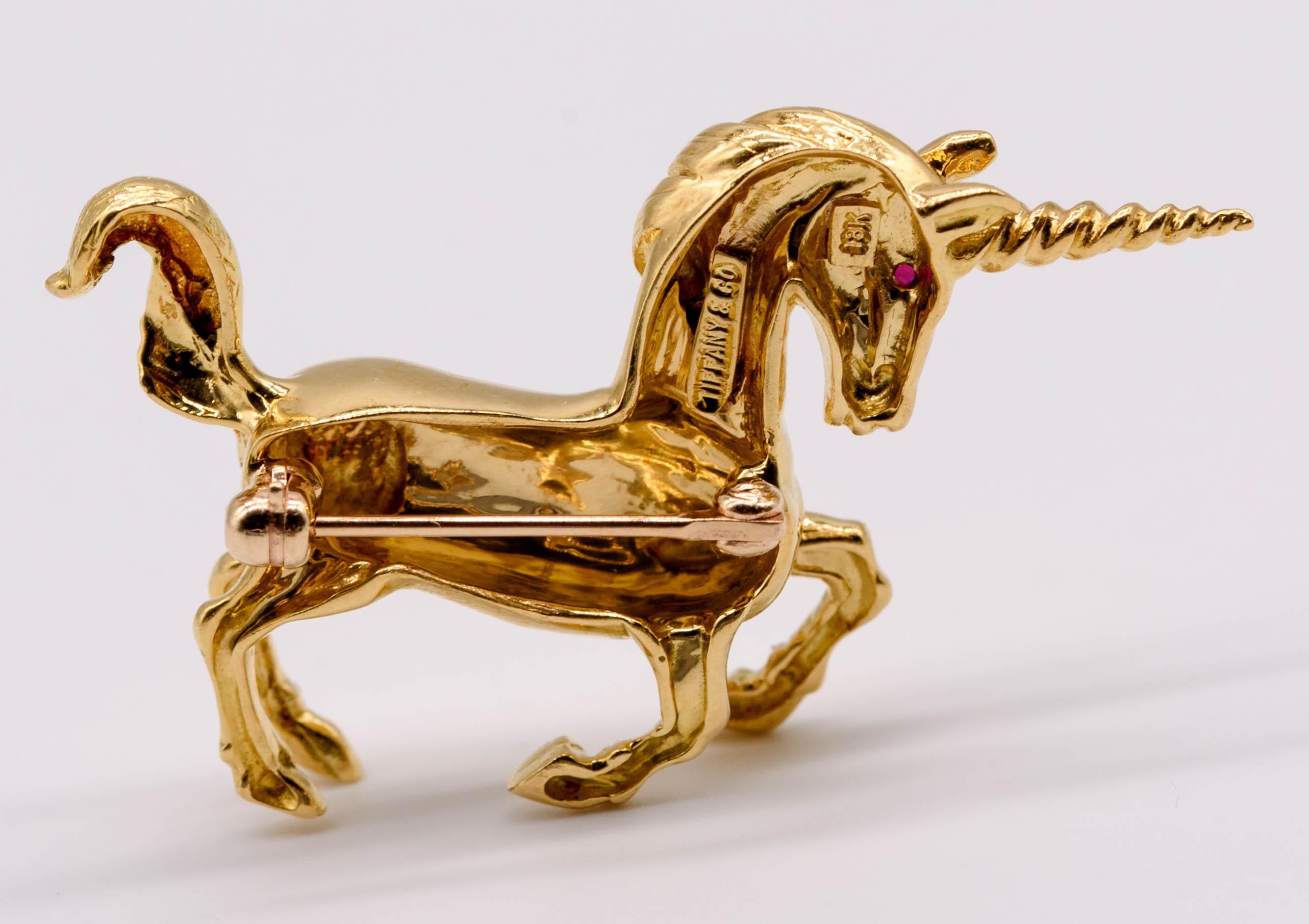 Depicting a charming little unicorn rearing his front legs and ready to begin his gallop, this Tiffany & Co pin measures 1 3/4