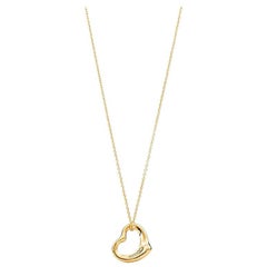 Tiffany & Co. 18 Karat Gold with Open Heart Pendant and Diamonds 0.02 Carat