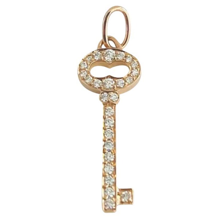 Tiffany & Co. 18 Karat Rose Gold and Diamond Mini Key Pendant For Sale