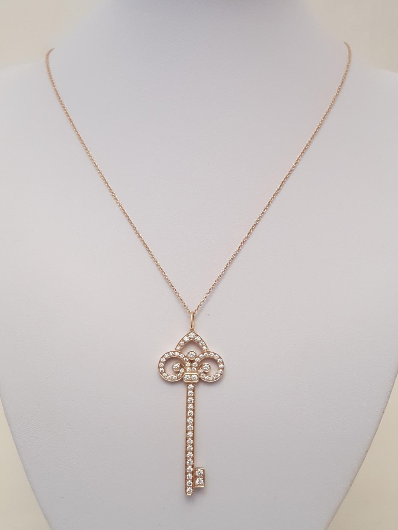 Women's or Men's Tiffany & Co. 18 Karat Rose Gold Diamond Fleur-de-Lis Diamond Key Necklace For Sale