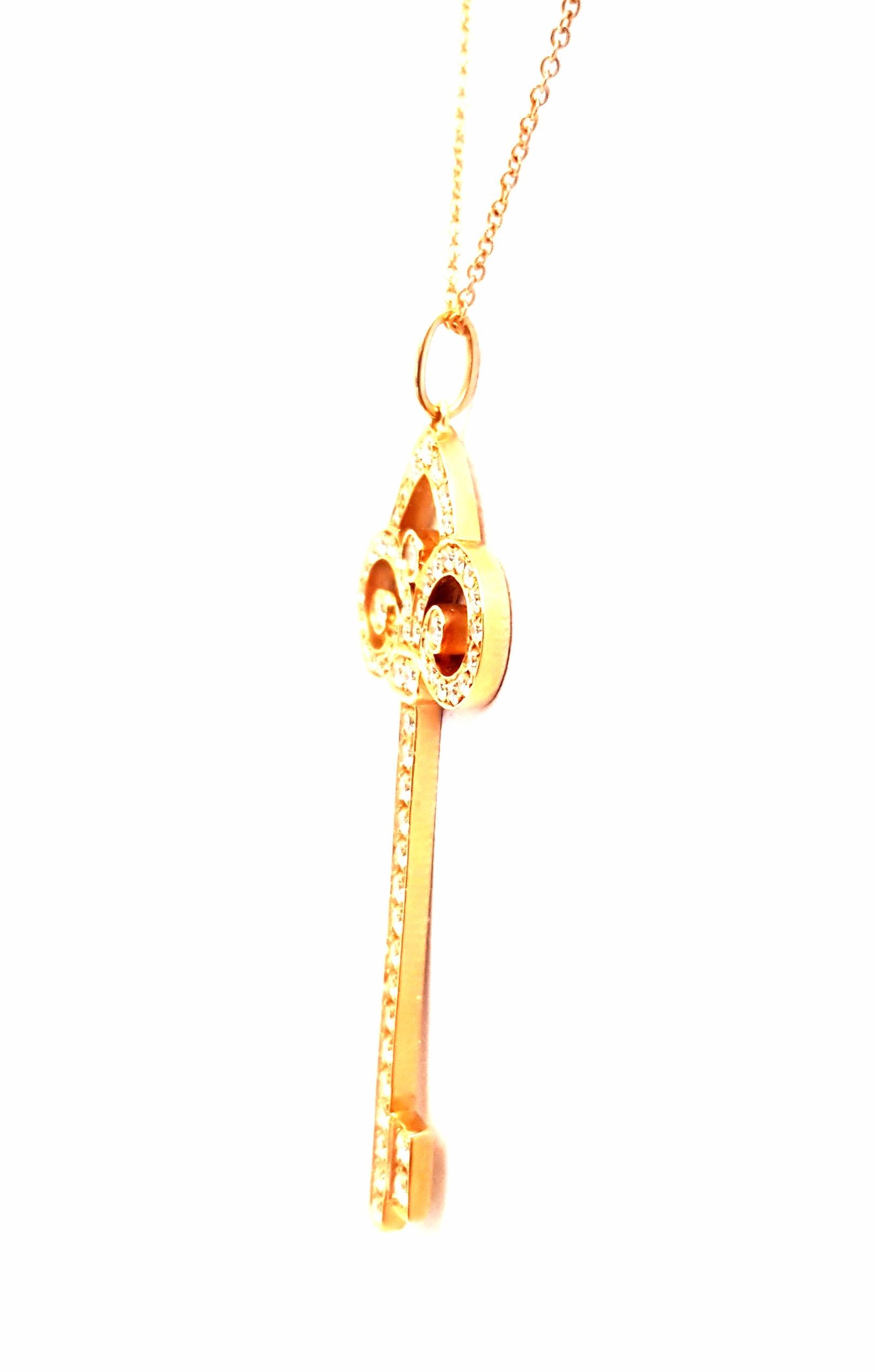 Tiffany & Co. 18 Karat Rose Gold Diamond Fleur-de-Lis Diamond Key Necklace For Sale 3