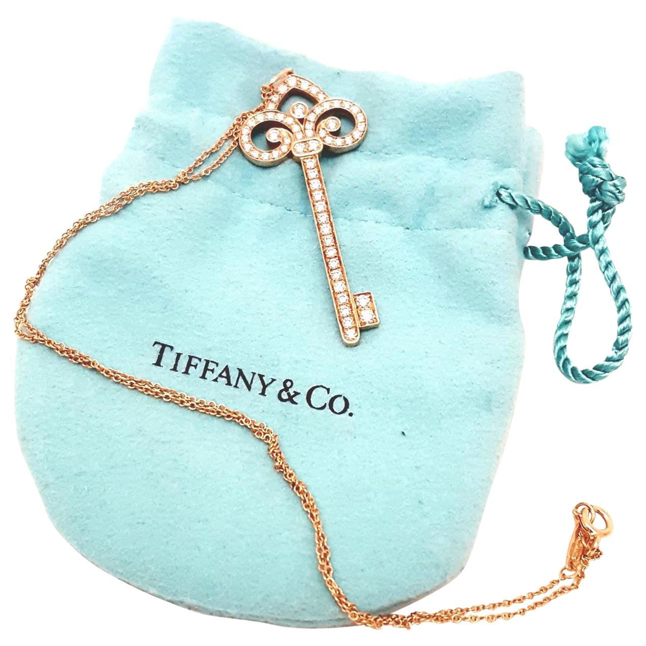 Tiffany & Co. 18 Karat Rose Gold Diamond Fleur-de-Lis Diamond Key Necklace For Sale