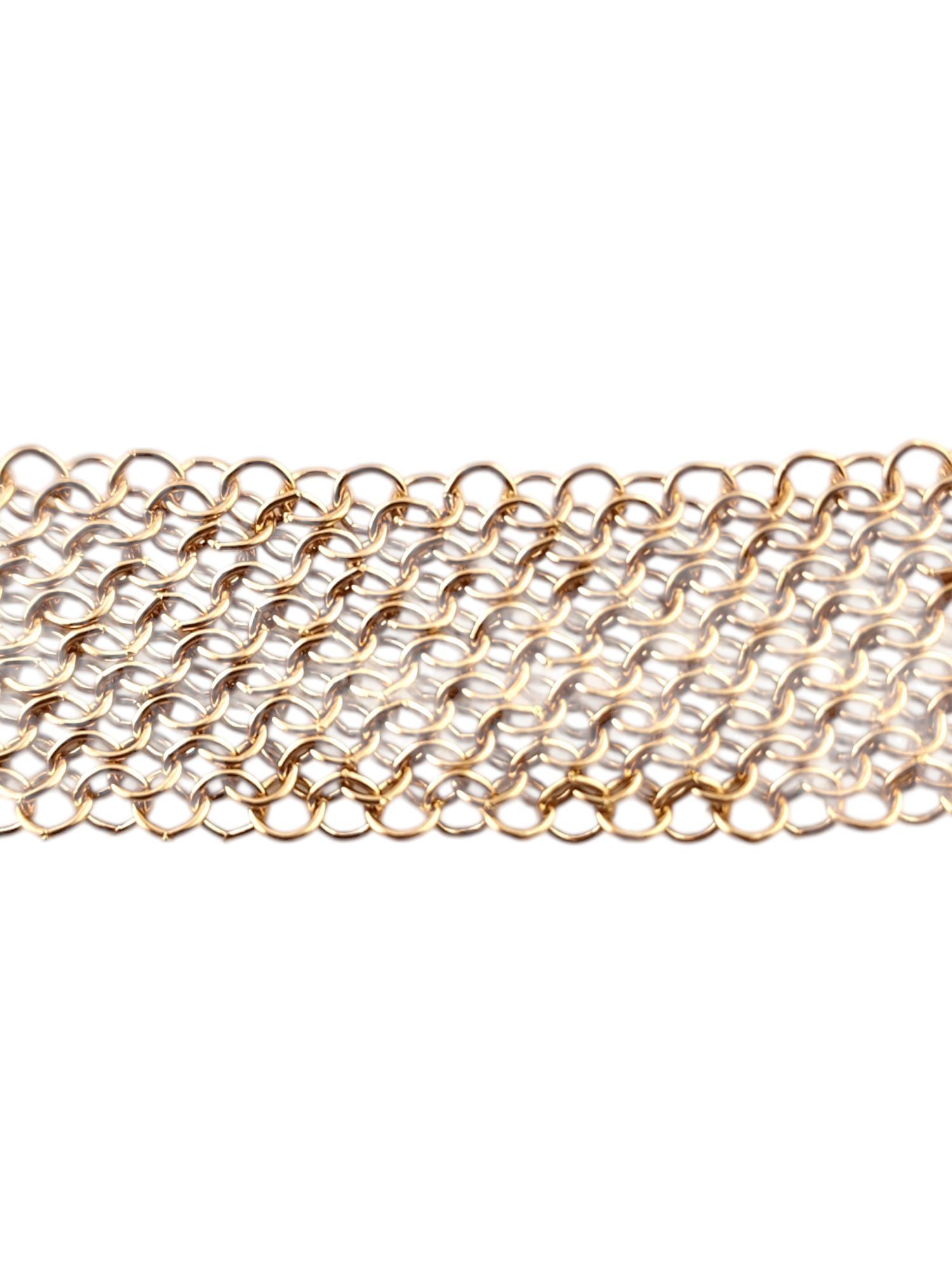 Tiffany & Co. 18 Karat Rose Gold Mesh Necklace 

This gorgeous mesh necklace by designer Tiffany & Co. was meticulously crafted from 18K rose gold!

Size: 36