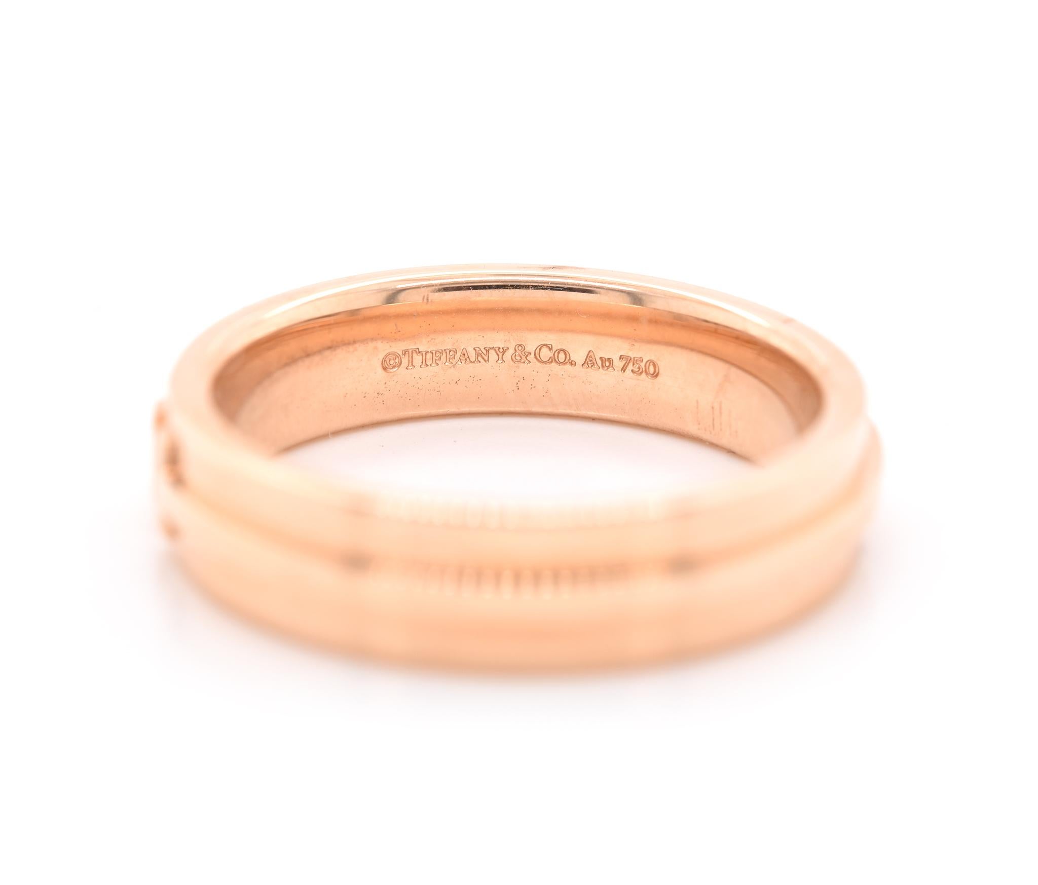 Designer: Tiffany & Co. 
Material: 18K rose gold
Dimensions: ring measures 5.5mm wide
Weight: 11.04 grams
Size: 10.5