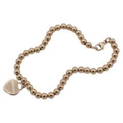 Tiffany & Co. 18 Karat Roségold Return To Tiffany Herz-Charm-Perlenarmband, Tiffany & Co.