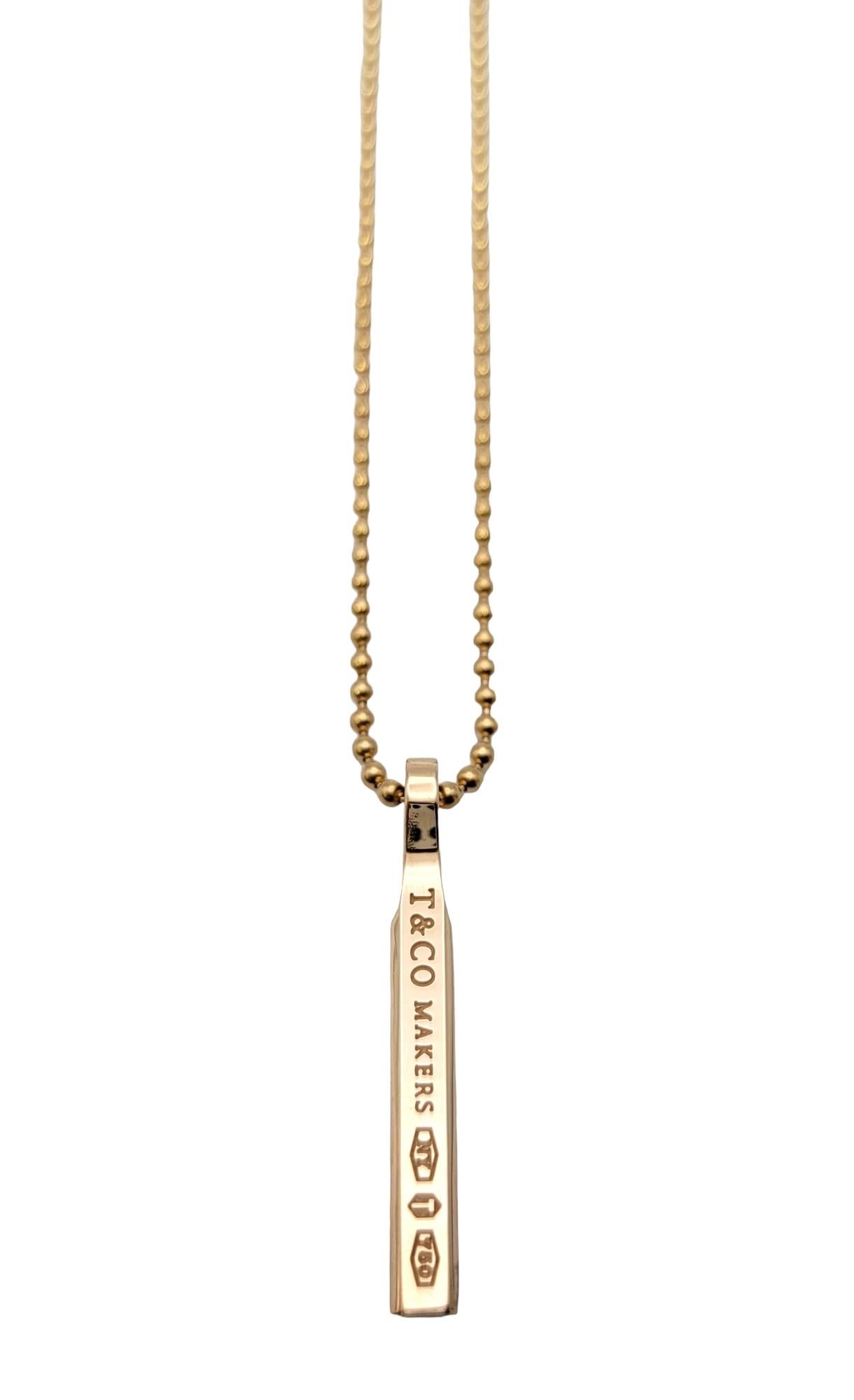 Chic bar necklace from Tiffany & Co. is stylish, modern and versatile. Founded in 1837 in New York City, Tiffany & Co. is one of the world's most storied luxury design houses recognized globally for its innovative jewelry design, extraordinary