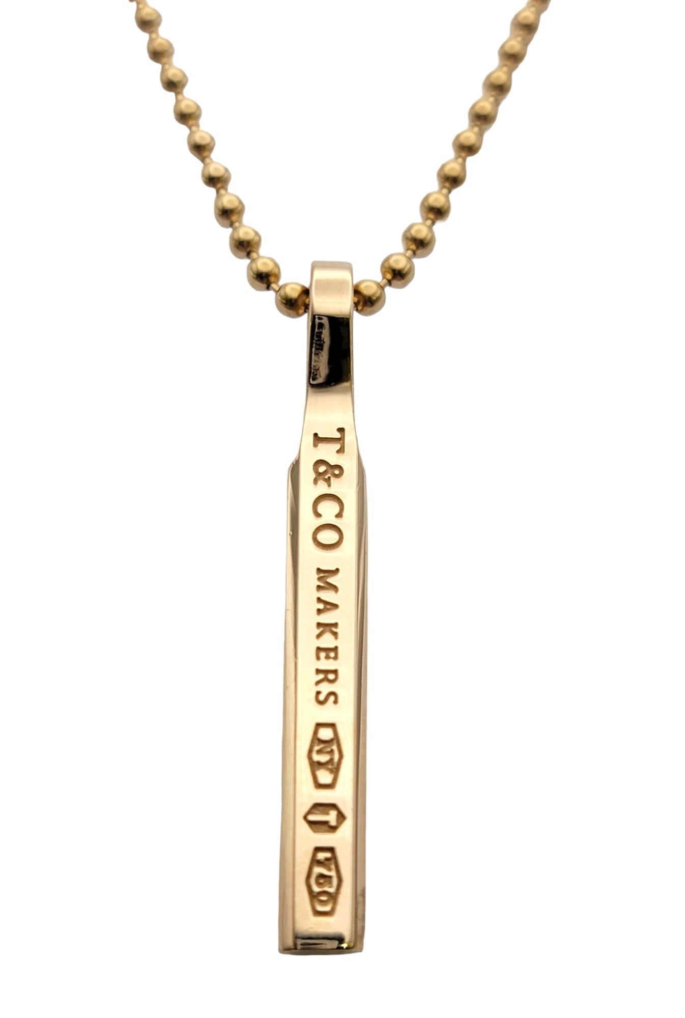 Contemporary Tiffany & Co. 18 Karat Rose Gold T & Co. Makers Vertical Bar Pendant Necklace