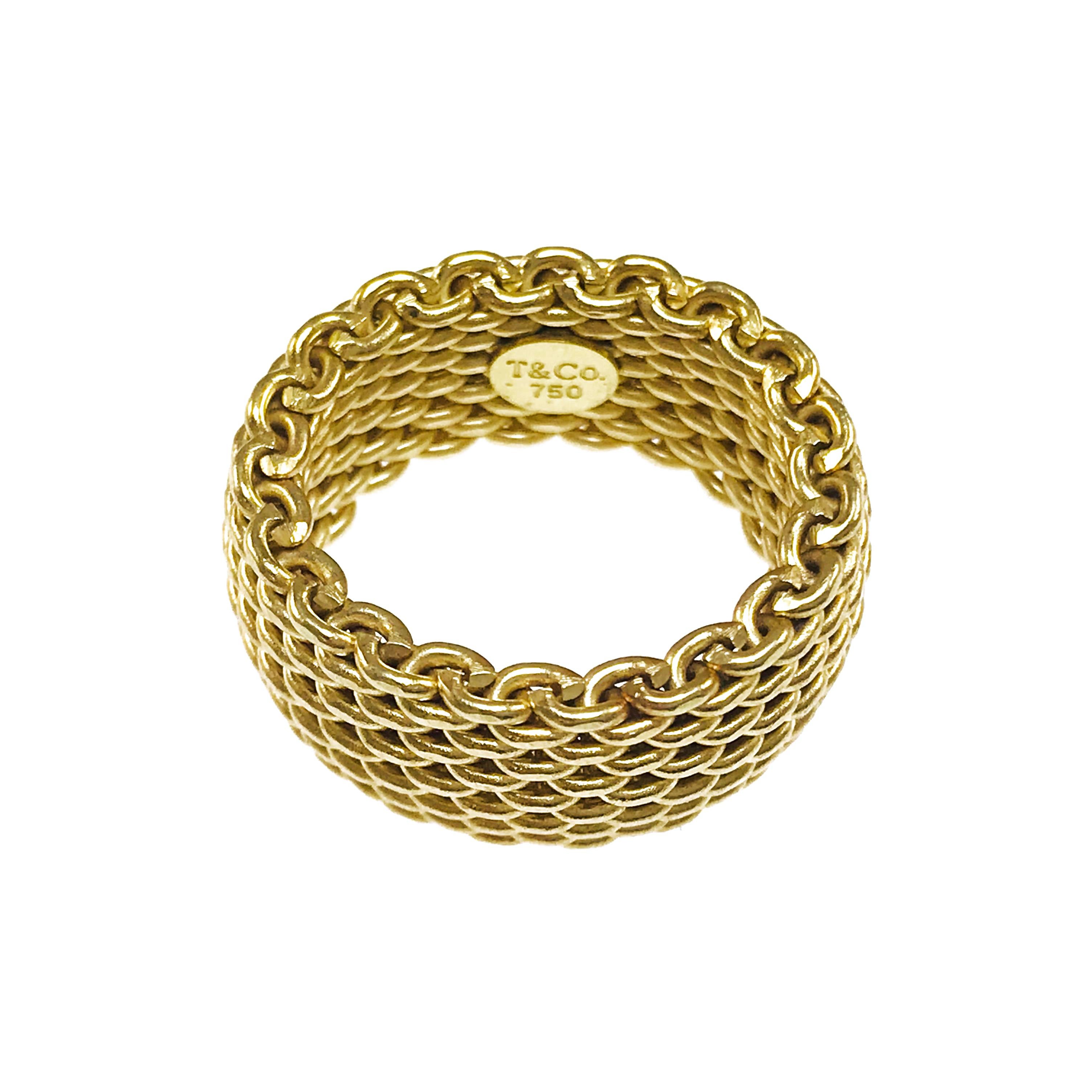 Tiffany & Co. 18 Karat Somerset Yellow Gold Mesh Ring. A fabulous wide ring with a continuous bold and intricate mesh design, a statement on it's own or paired with the matching bangle bracelet (see our storefront). Stamped on the inside is T&Co.