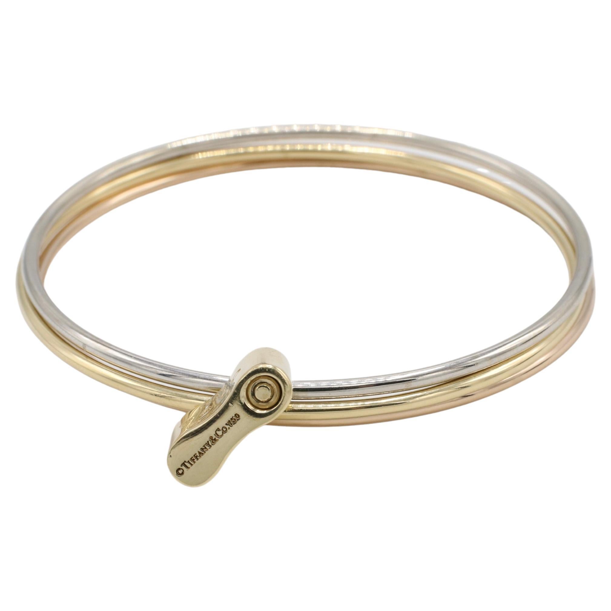 Tiffany & Co. 18 Karat Tri-Color Three Bangle 1837 Lock Bracelet In Excellent Condition In  Baltimore, MD