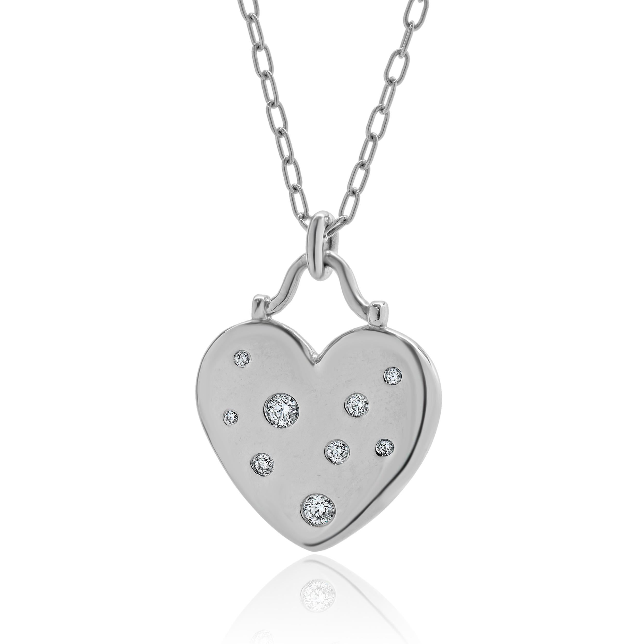 Designer: Tiffany & Co. 
Material: 18K white gold
Diamond: 9 round brilliant cut = 0.25cttw
Color: G
Clarity: SI1
Dimensions: necklace measures 16-inches
Weight: 14.53 grams
