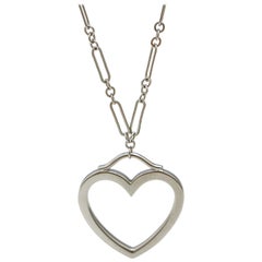 Tiffany 
Co. 18 Karat White Gold Heart Pendant Necklace