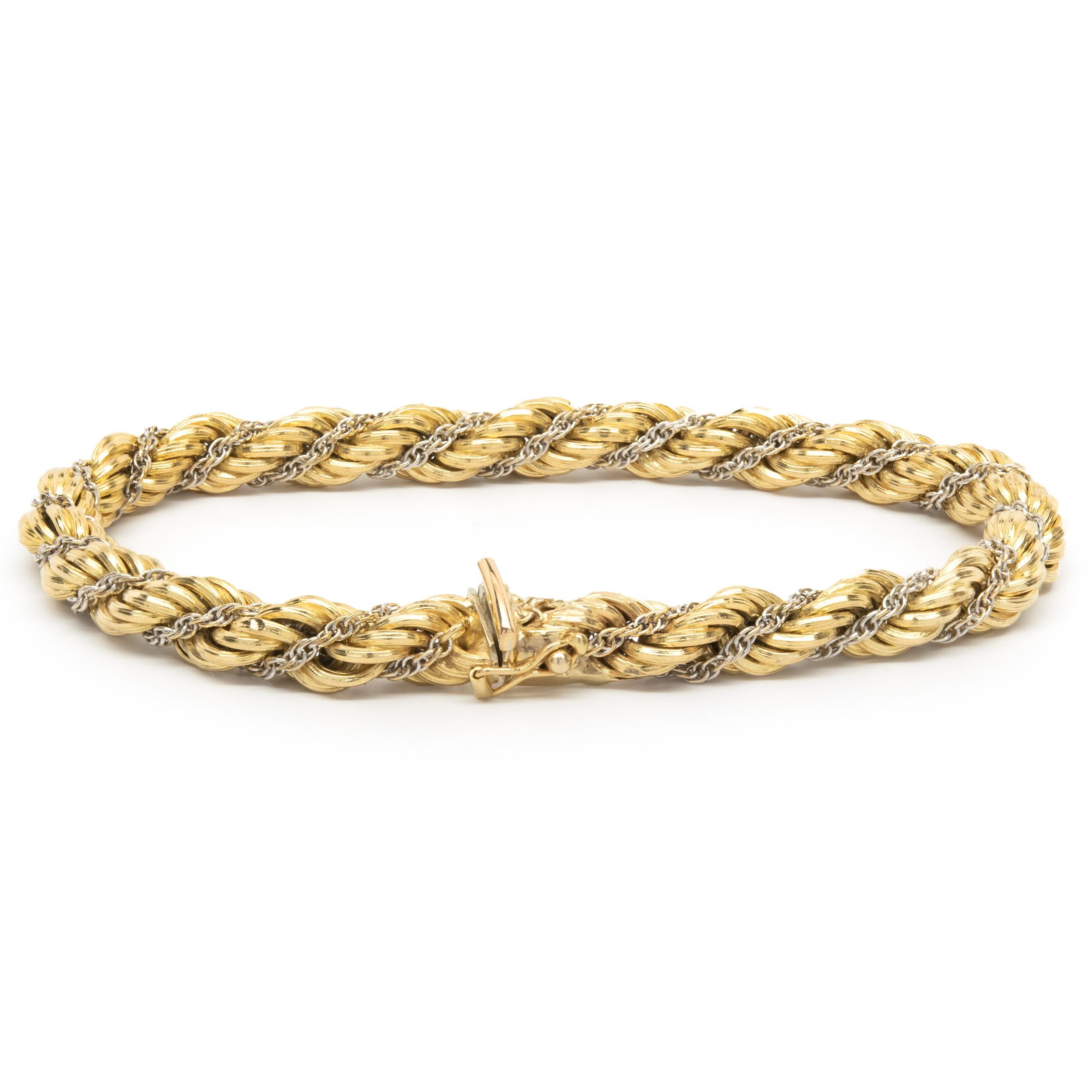 Designer: Tiffany & Co. 
Material: 18K yellow and white gold
Dimensions: bracelet measures 8-inches in length
Weight: 17.22 grams
