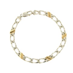 Tiffany 
Co. 18 Karat Yellow Gold 925 Silver Figaro Chain Bracelet
