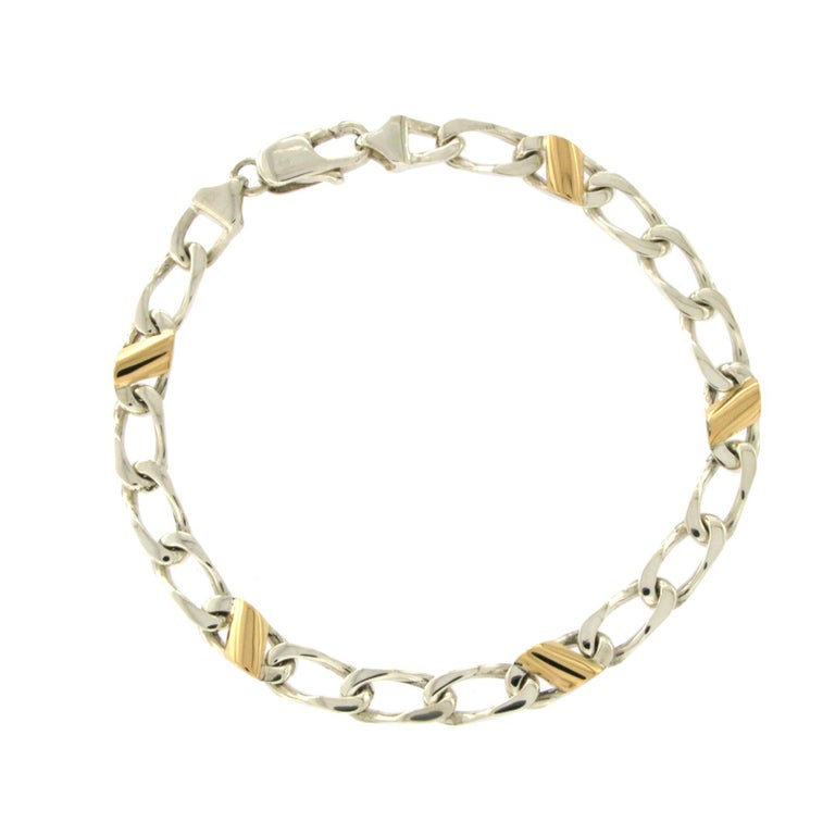 Tiffany and Co. 18 Karat Yellow Gold 925 Silver Figaro Chain Bracelet at  1stDibs