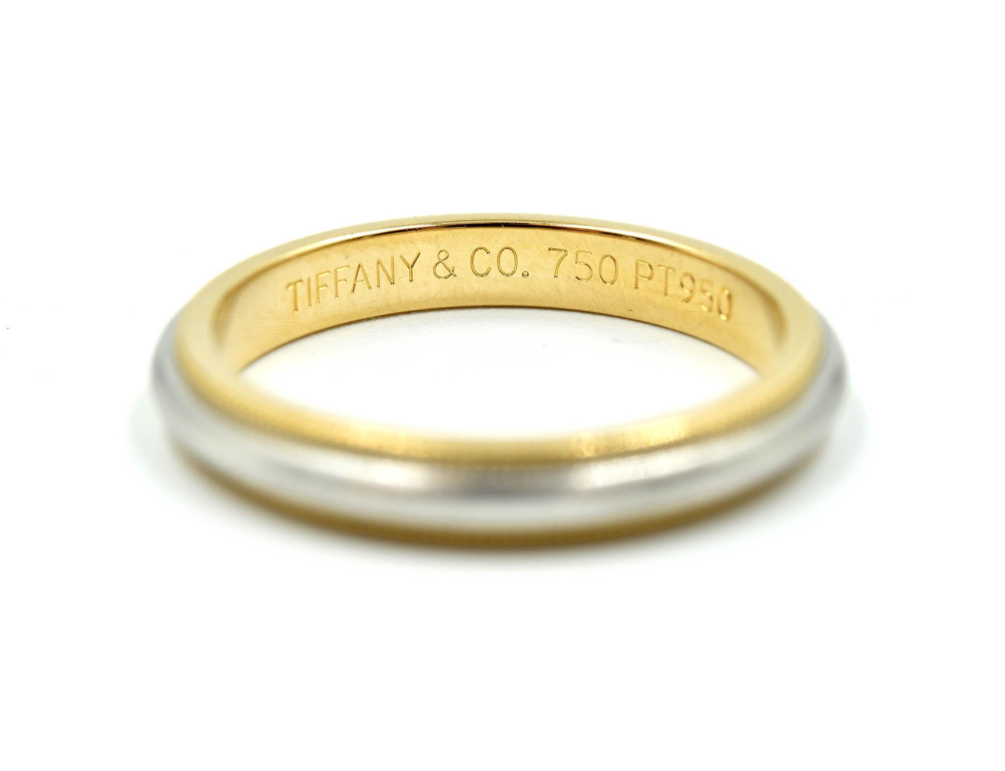 Designer: Tiffany & Co
Material: 18k yellow gold and platinum
Dimensions: 3.45mm wide
Ring Size: 9.50
Weight: 6.40 grams
