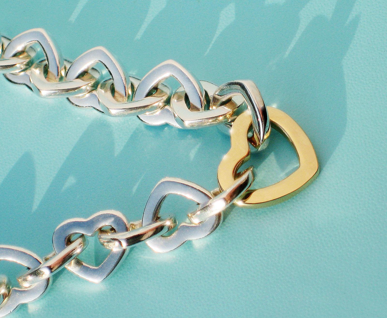 Modern Tiffany & Co. 18 Karat Yellow Gold and Sterling Silver Heart Bracelet