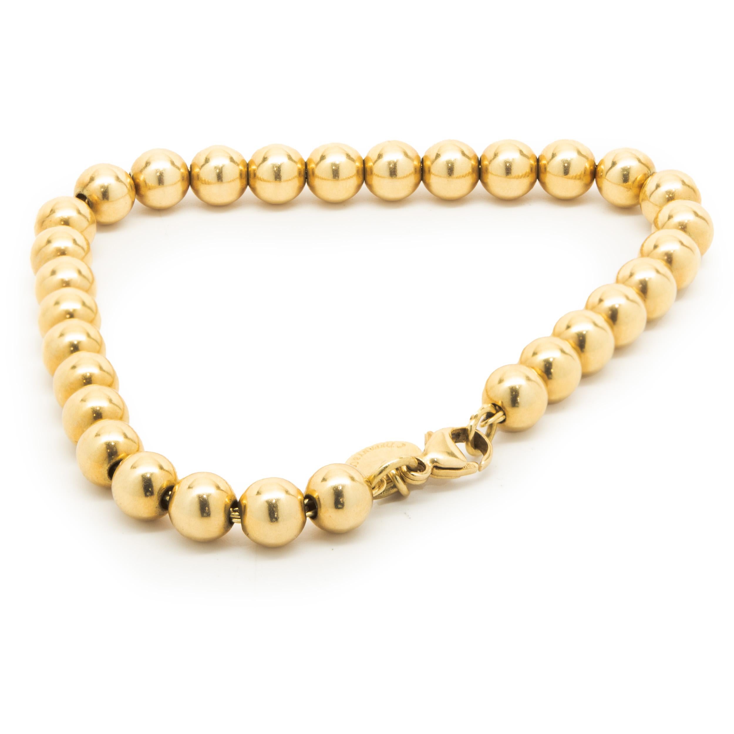 Designer: Tiffany & Co. 
MATERIAL: 18K Gelbgold
Abmessungen: Das Armband passt an ein 6.25-Zoll-Handgelenk
Gewicht: 10.45 Gramm
