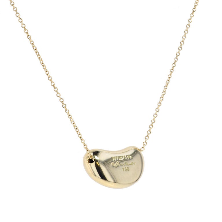Tiffany and Co. 18 Karat Yellow Gold Bean Pendant Necklace at 1stDibs