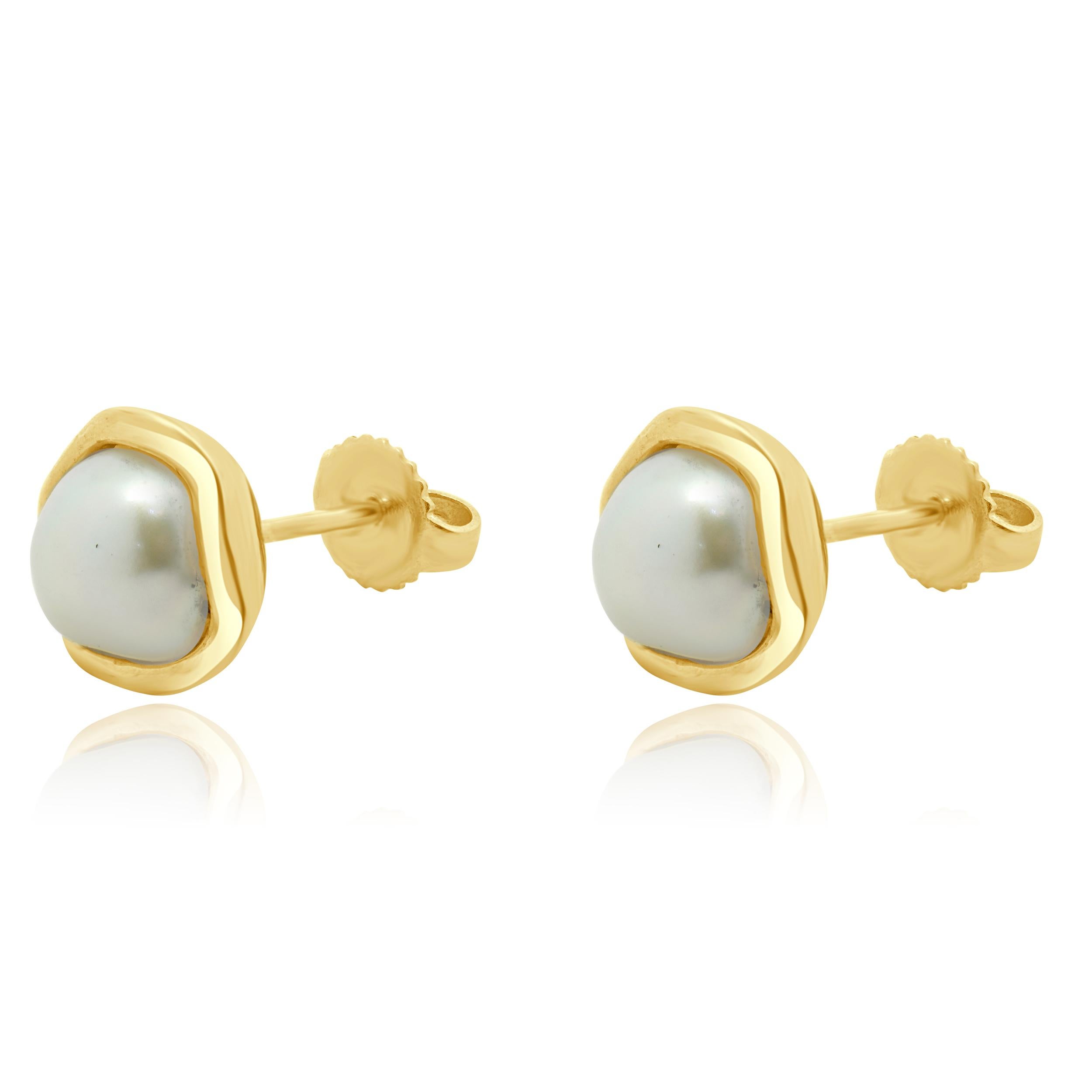 Designer: Tiffany & Co. 
Material: 18K yellow gold
Dimensions: earrings measure 9.6 x 9.7mm
Weight: 4.30 grams
