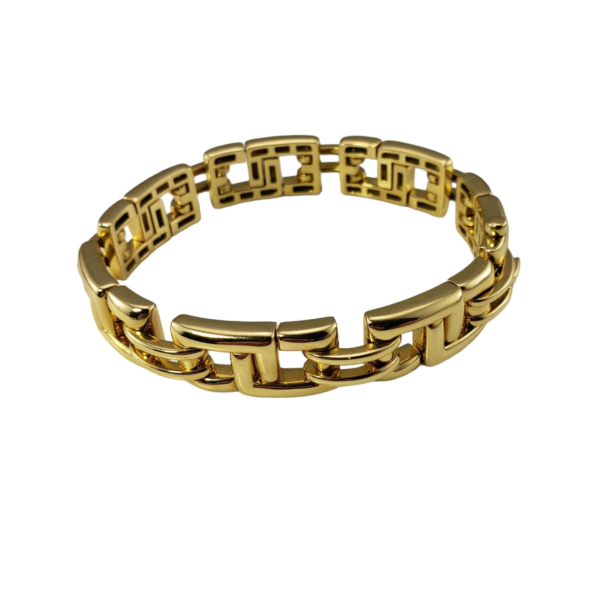 Vintage Tiffany & Co. 18K Yellow Gold Biscayne Bracelet-

This elegant link bracelet by Tiffany & Co. is crafted in beautifully detailed 18K yellow gold. Pull pin closure.

Width: 13 mm.

Size: 7.5 inches end to end

Bracelet size: 7