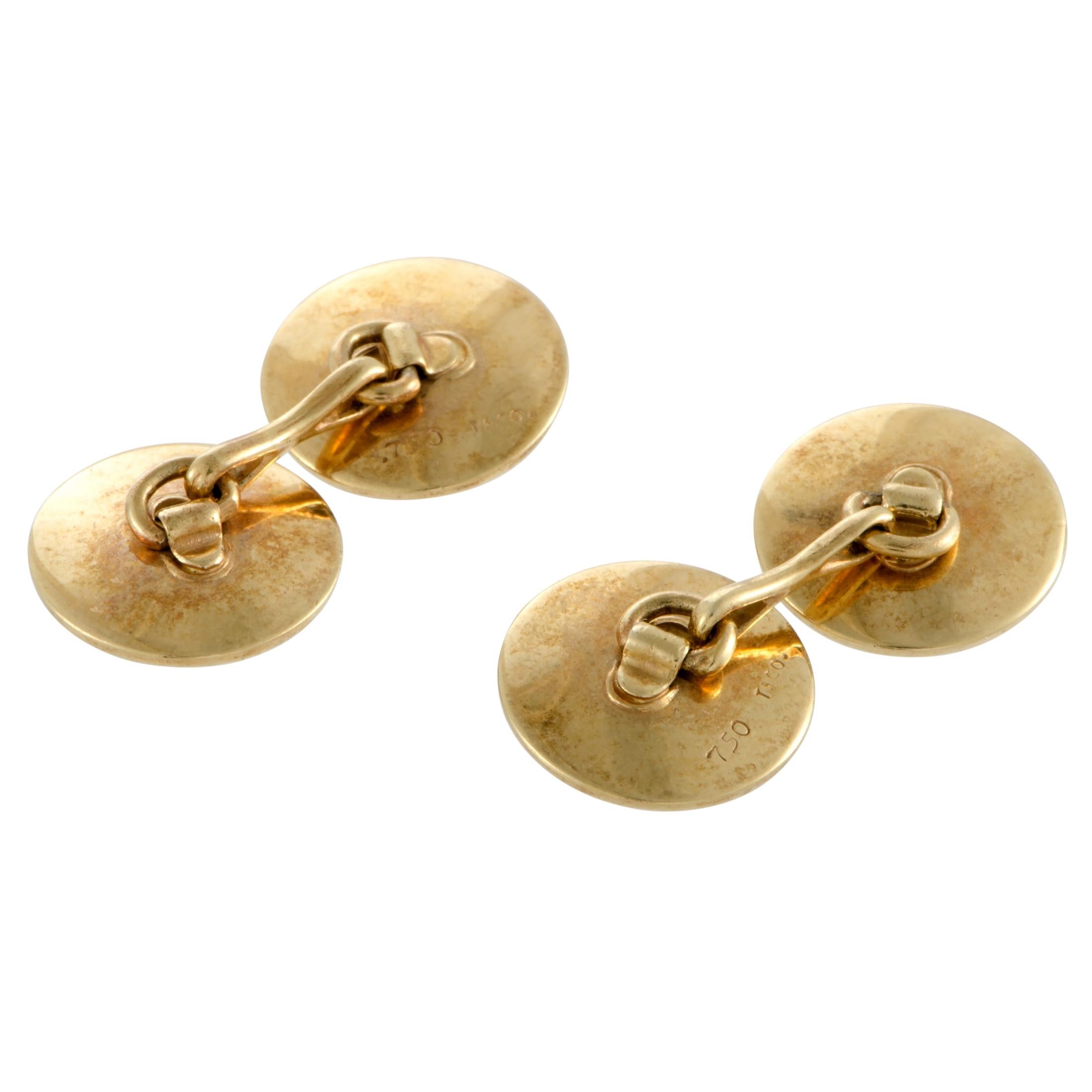 Relying on the inherent prestigious appeal of radiant 18K yellow gold and bringing out its remarkable aesthetic quality through exquisite craftsmanship, Tiffany & Co. created this sumptuous pair of cufflinks exuding understated excellence and fine