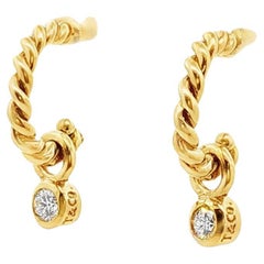 Tiffany & Co. Orecchini moderni a cerchio con diamante in oro giallo 18 carati