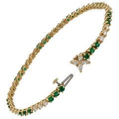 Tiffany & Co. 18 Karat Yellow Gold Diamond and Emerald Tennis Bracelet