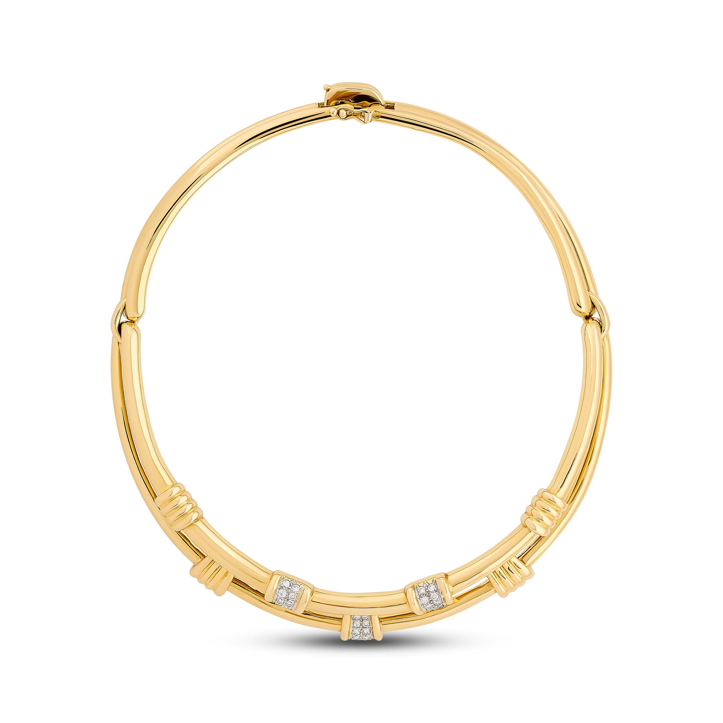 This sophisticated Tiffany & Co. 18k yellow gold collar necklace features a double band collar highlighted by three square stations of brilliantly-cut pavé diamonds.

There are 38 round diamonds that weigh about 0.60 total carat weight; they are F-G