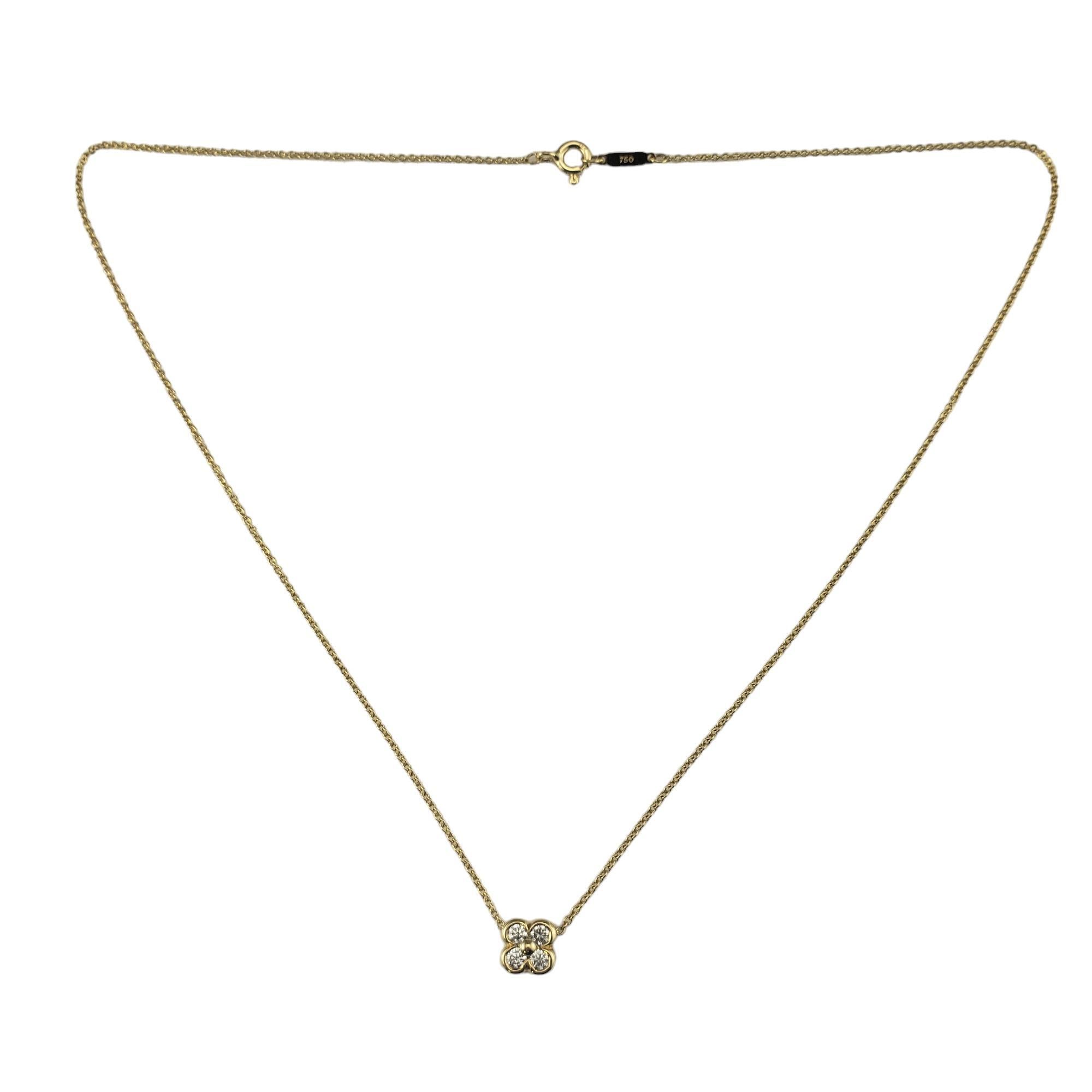 Tiffany & Co. 18 Karat Yellow Gold and Diamond Flower Necklace

This sparkling flower necklace by Tiffany and Co. features four round brilliant cut diamonds set in beautifully detailed 18K yellow gold.  

Approximate total diamond weight: .28
