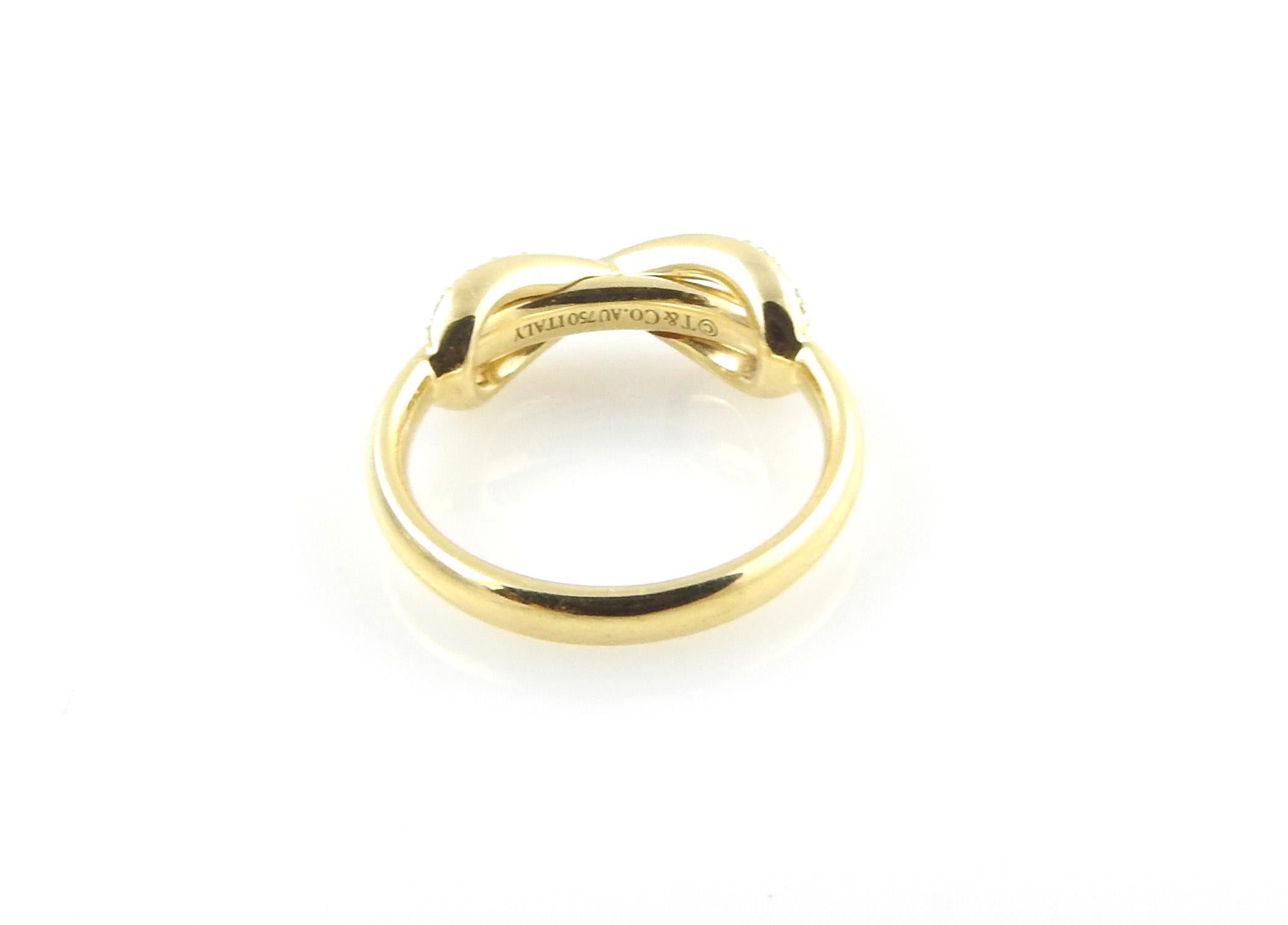 Tiffany & Co. Unendlichkeitsring aus 18 Karat Gelbgold mit Diamanten in Box/Tasche/Buchstütze 1