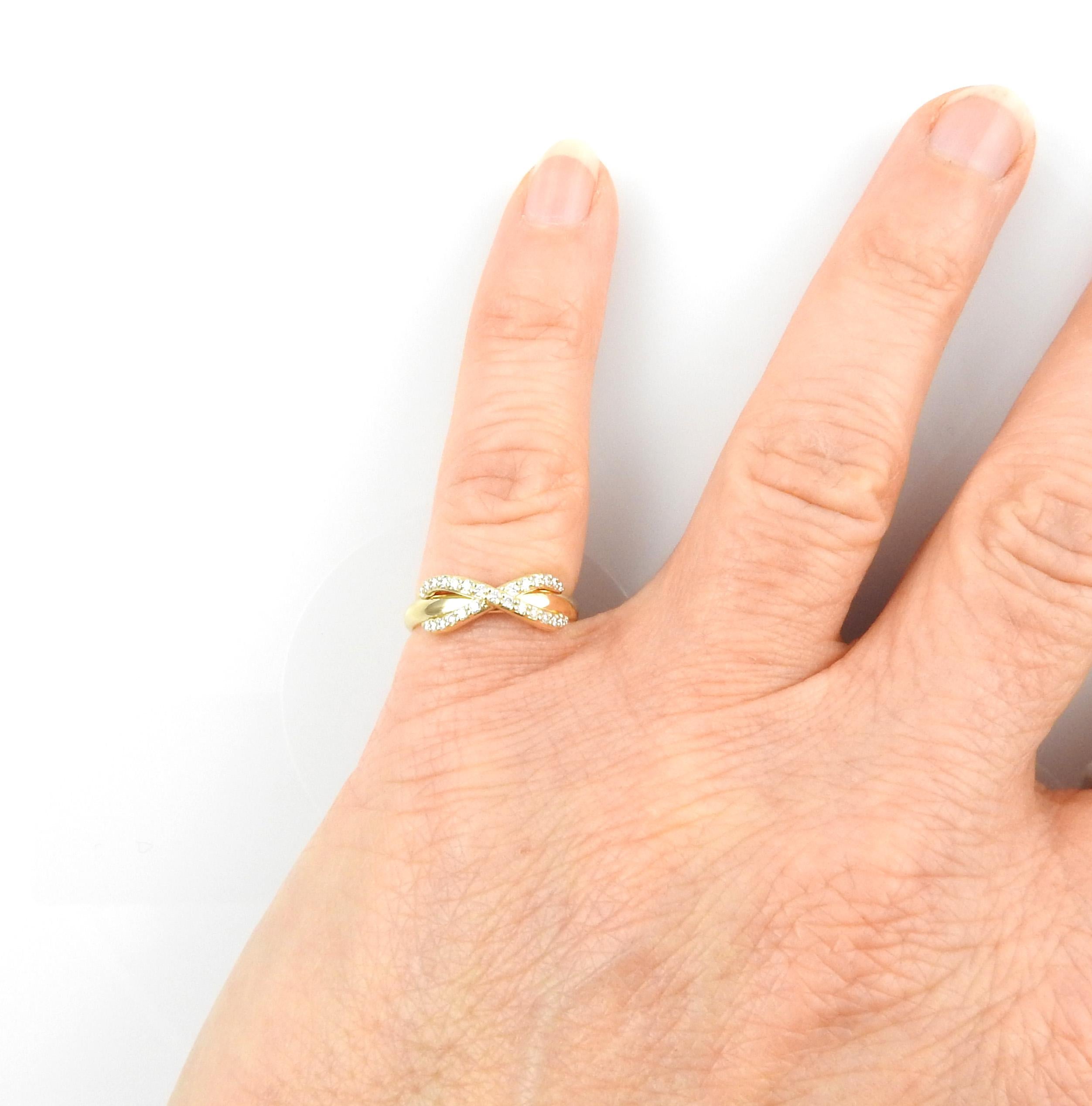 Tiffany & Co. Unendlichkeitsring aus 18 Karat Gelbgold mit Diamanten in Box/Tasche/Buchstütze 4