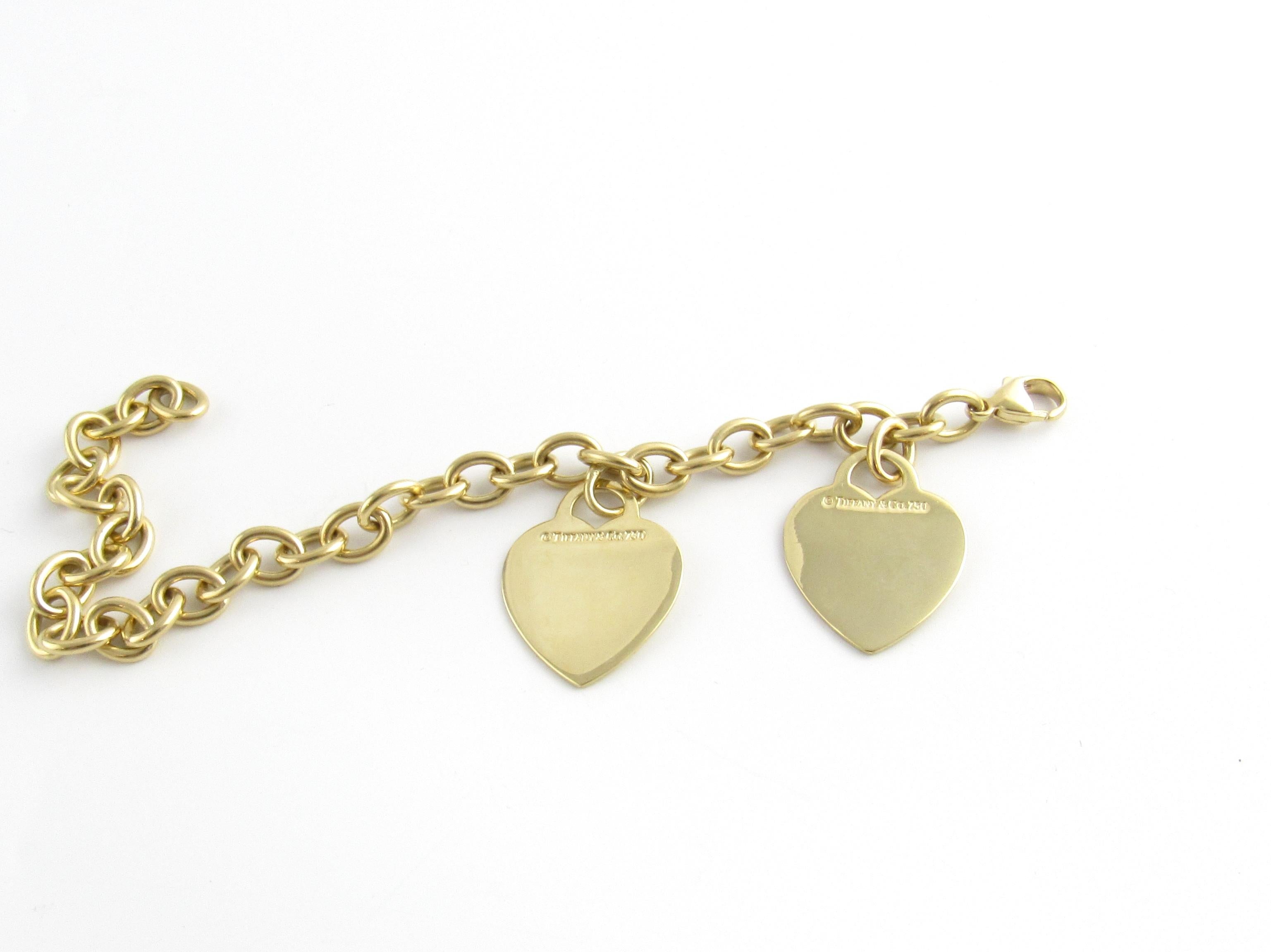 Tiffany & Co. 18 Karat Yellow Gold Double Heart Tag Charm Link Bracelet In Good Condition In Washington Depot, CT