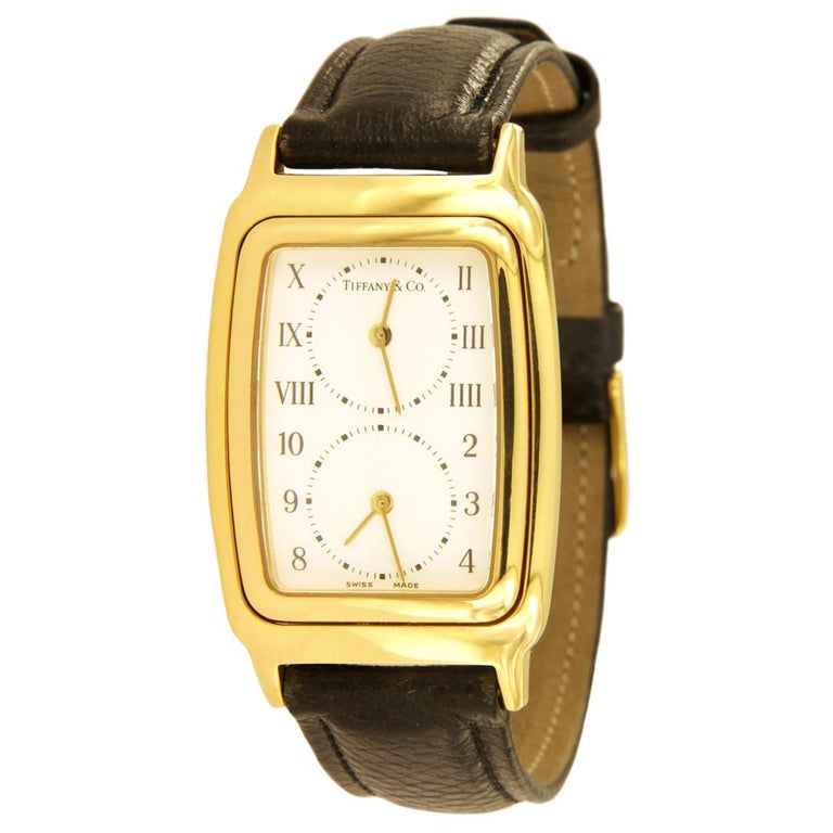 Tiffany and Co. 18 Karat Yellow Gold Dual Time Zone Watch M203 at 1stDibs
