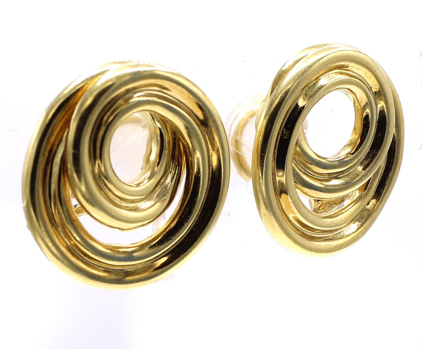 Chic 18 Karat yellow gold ear clips by Tiffany & Co. Diameter 7/8 inches. Stamped T & Co 750 on back of earrings
