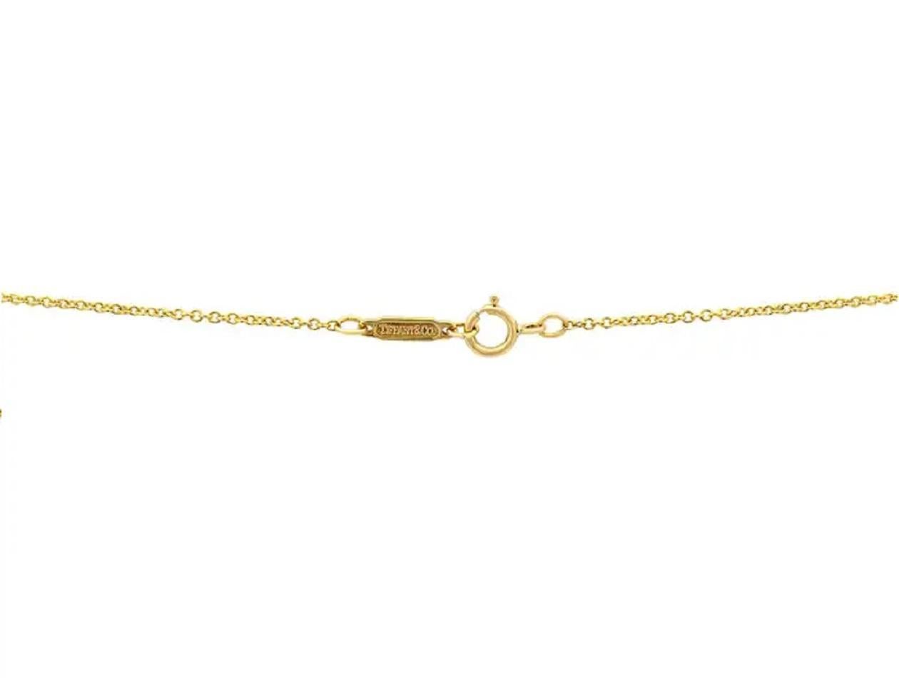 Women's Tiffany & Co. 18 Karat Yellow Gold Etoile Diamond Platinum Ball Pendant Necklace For Sale