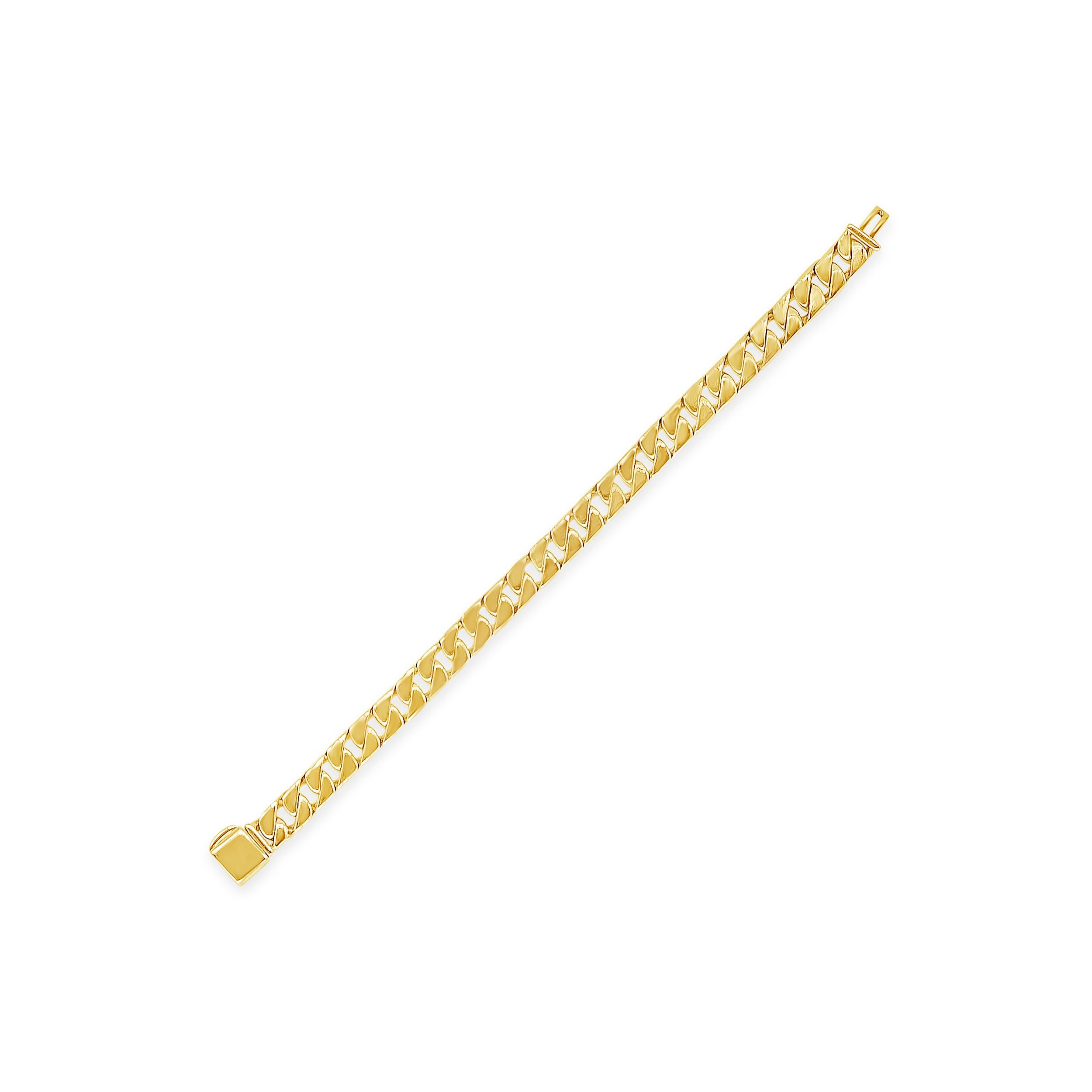A stylish gold chain men's bracelet showcasing geometric links made of 18k yellow gold weighing 66.6 grams. 8.02 inches in length and 0.32 inches in width. Made and signed by Tiffany & Co.