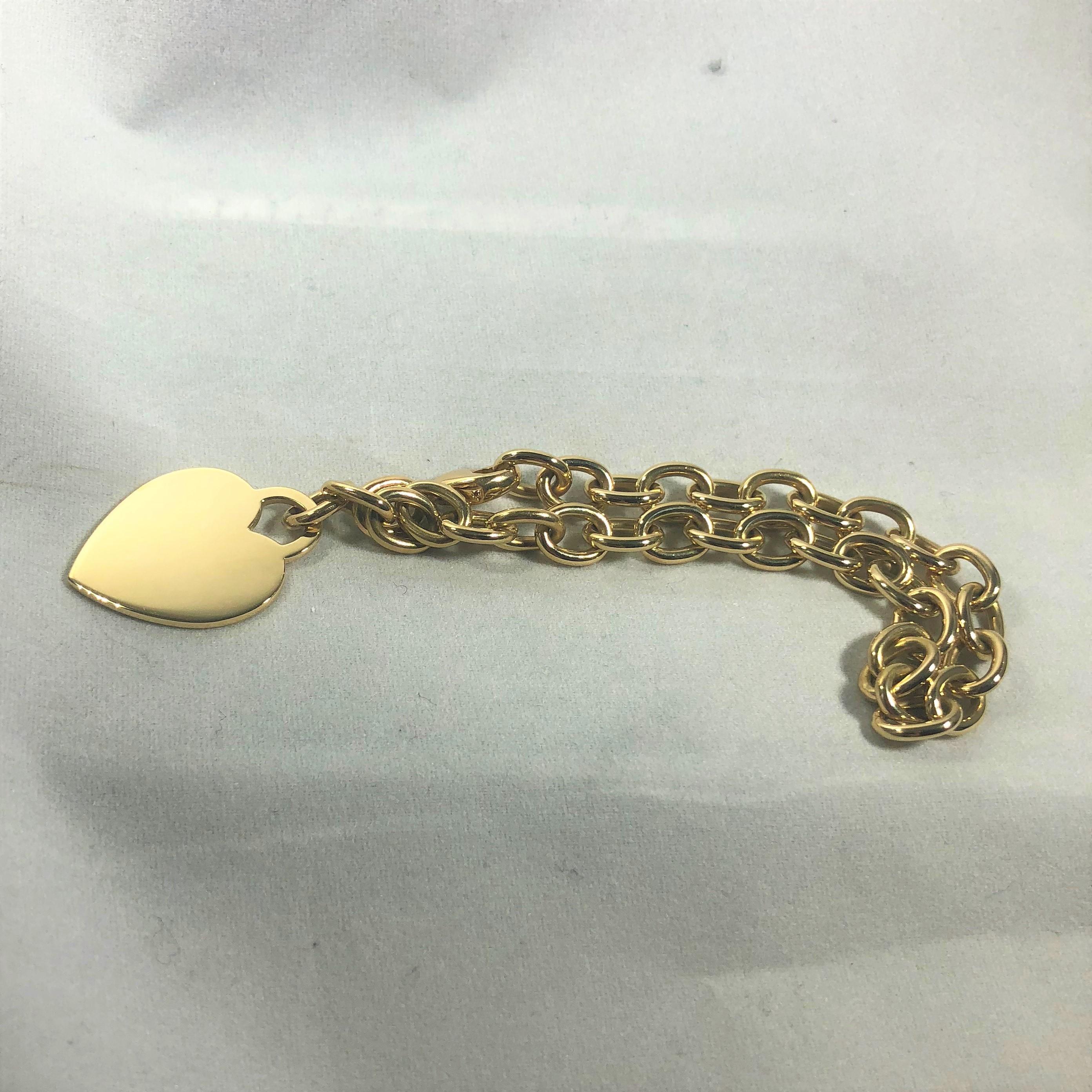 Tiffany & Co. 18 Karat Yellow Gold Heart Tag Charm Bracelet 6