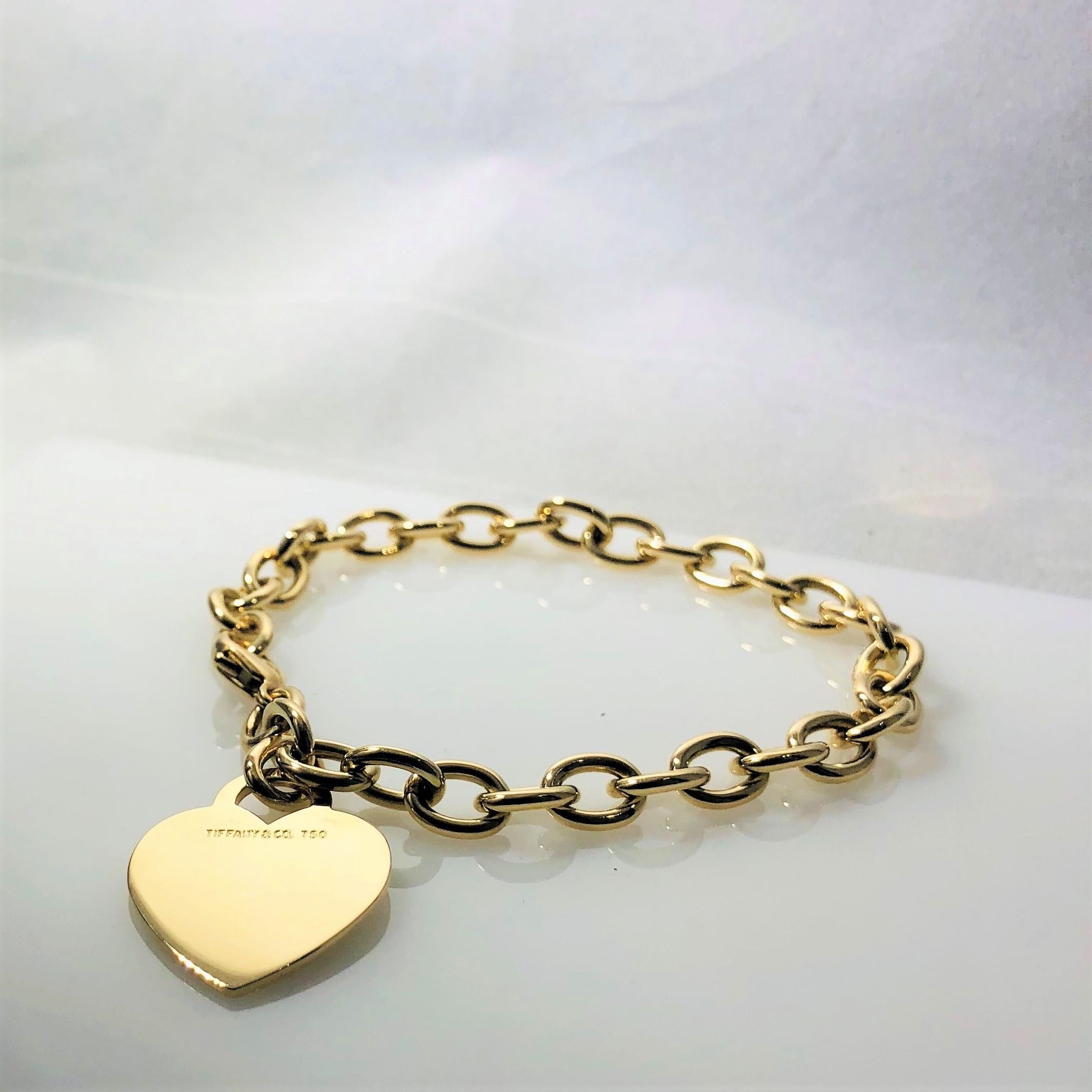 Contemporary Tiffany & Co. 18 Karat Yellow Gold Heart Tag Charm Bracelet