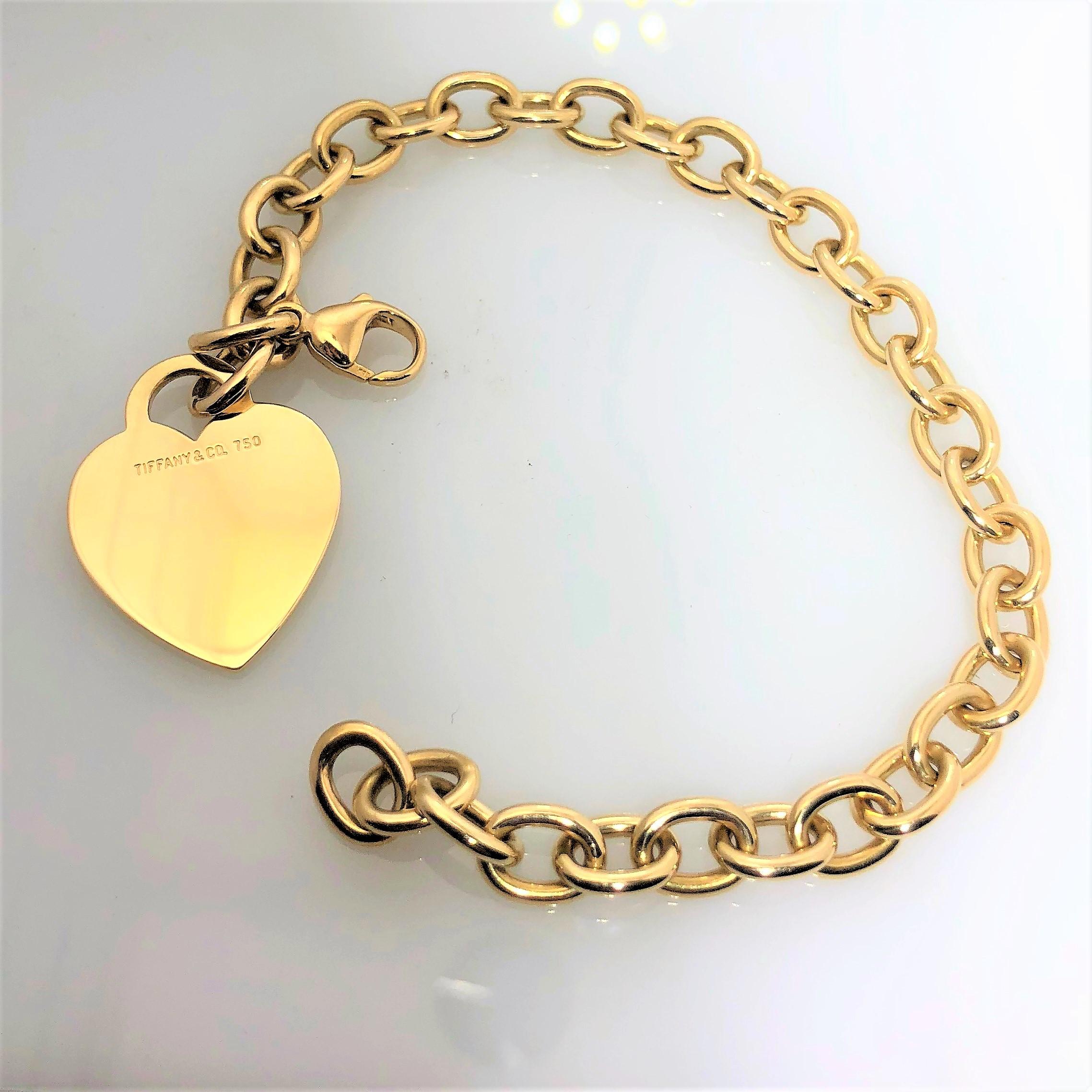 Women's or Men's Tiffany & Co. 18 Karat Yellow Gold Heart Tag Charm Bracelet