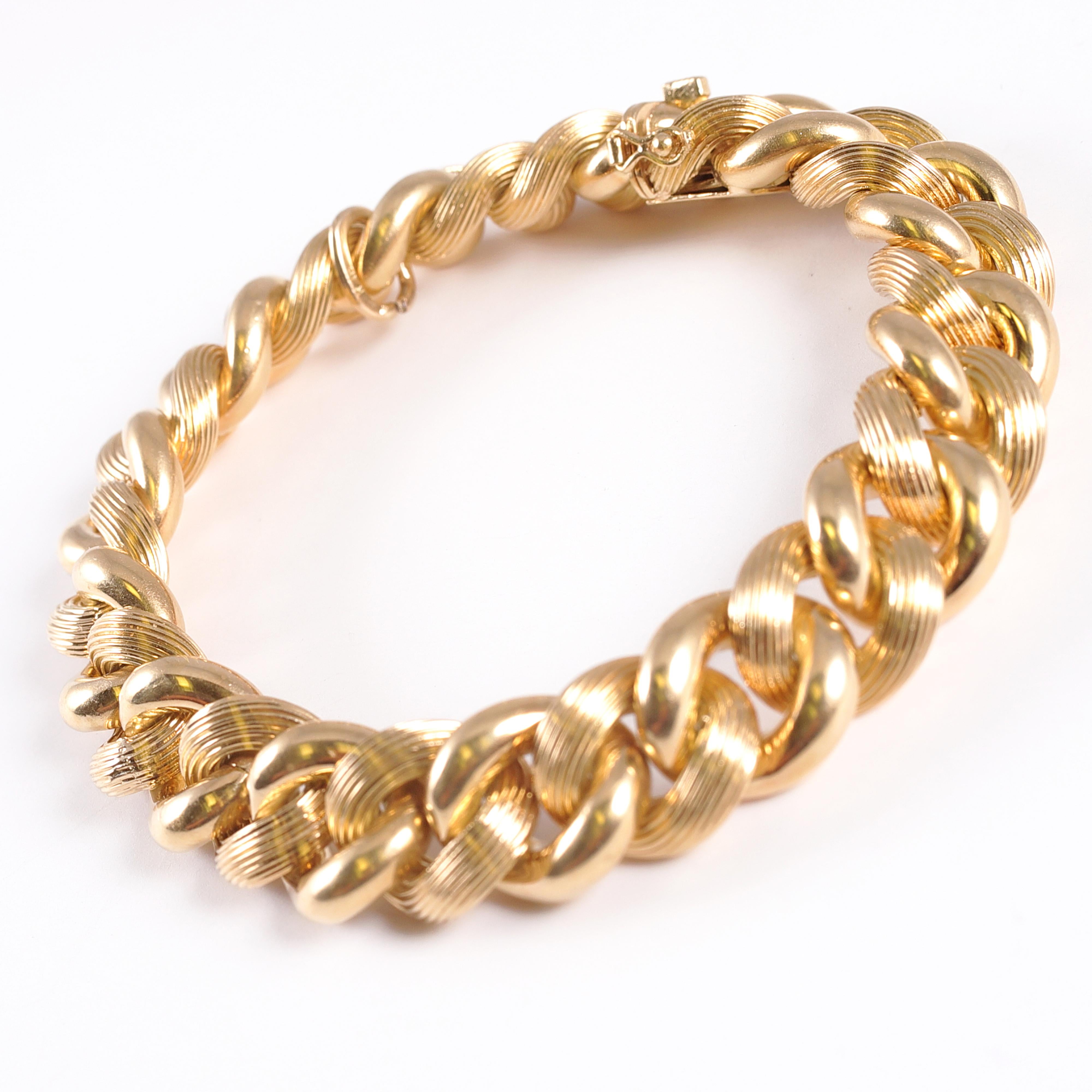 18 karat yellow gold textured link bracelet by Tiffany & Co.  This bracelet is 7 1/4 inches.