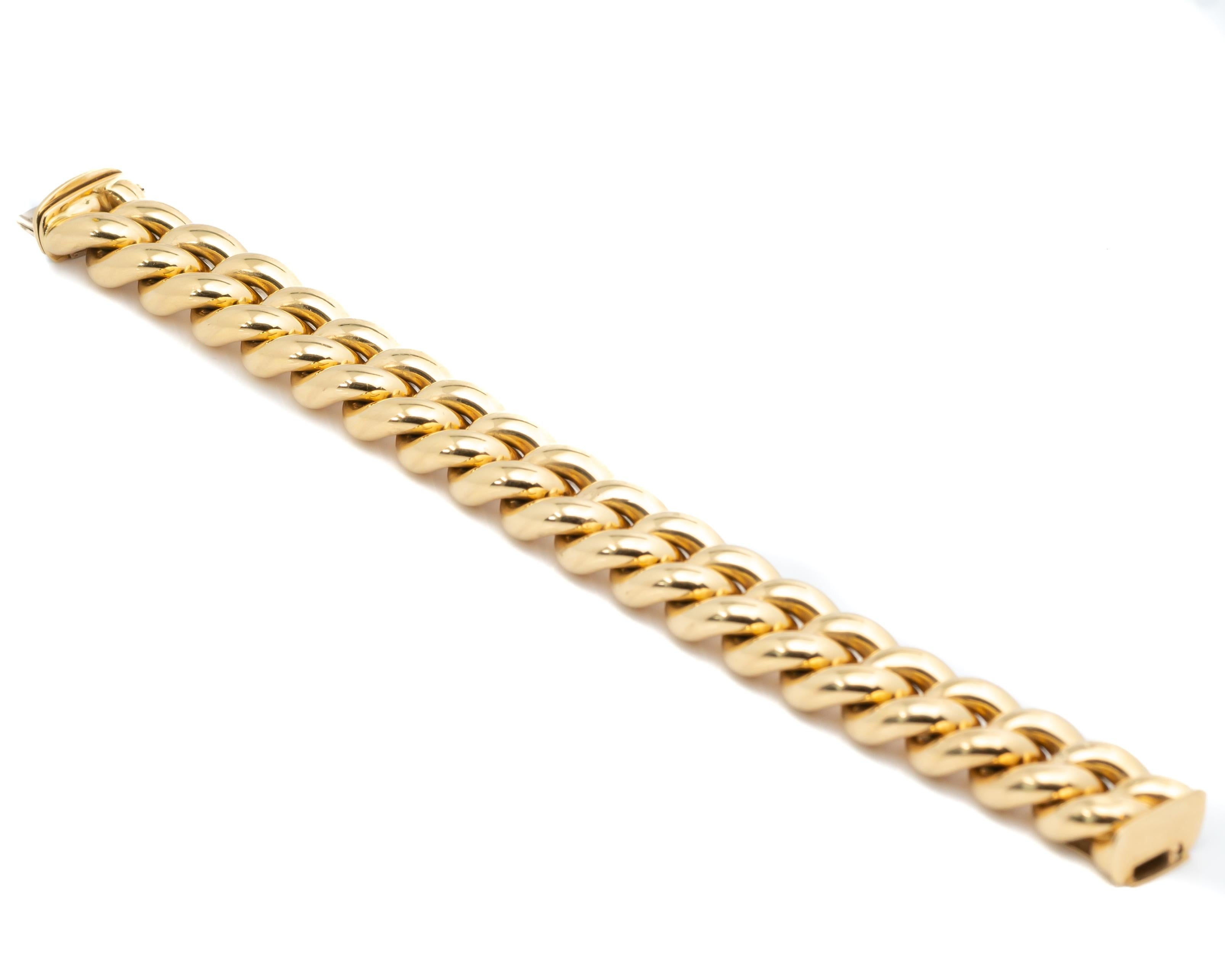 Beautifully crafted 18 Karat yellow gold high polish bracelet
Made by iconic Tiffany & Co (hallmarked)
1980s Vintage 
Resembles a cuban link bracelet 

Bracelet details:
Weight: 67.4 grams
Gold: 18 Karat yellow gold (hallmarked)
Measurements: 16