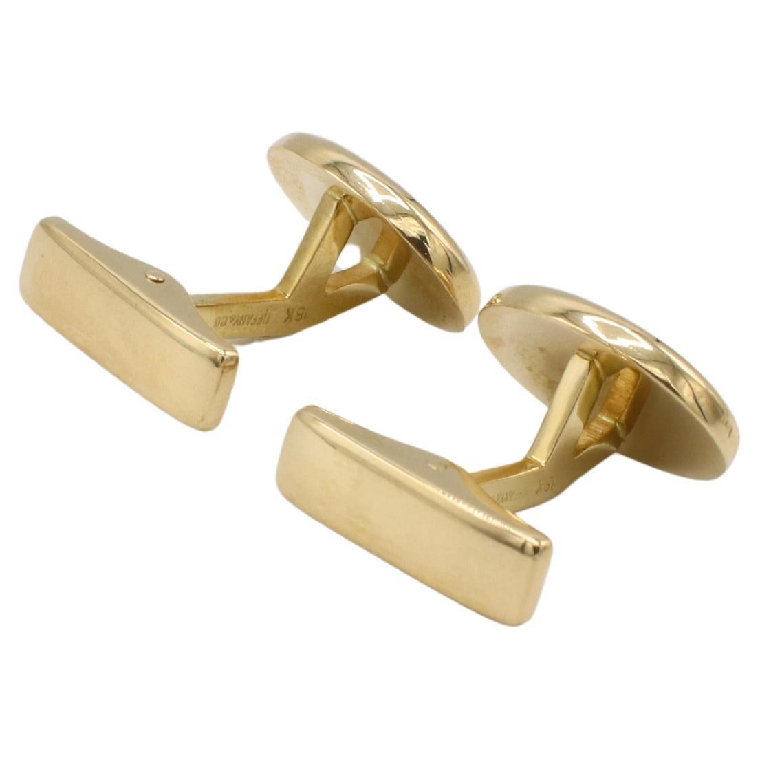 Gemelos franceses ovalados de oro amarillo de 18 quilates Tiffany & Co. 
Metal: oro amarillo de 18 quilates
Peso: 11,93 gramos
Oval: 12,5 mm x  15.5mm
Longitud: 21 mm
Firmado: 18K Tiffany & Co. W.Alemania
LTD F35001359