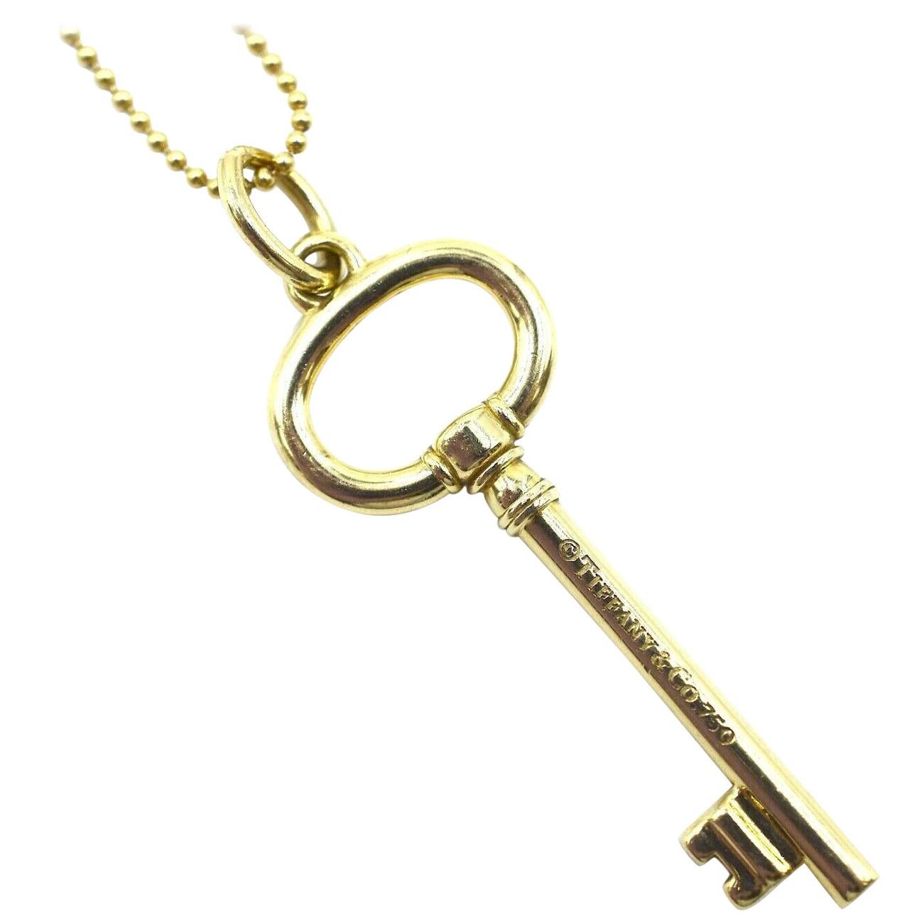 Ovaler Schlüsselanhänger und Halskette von Tiffany & Co. aus 18 Karat Gelbgold