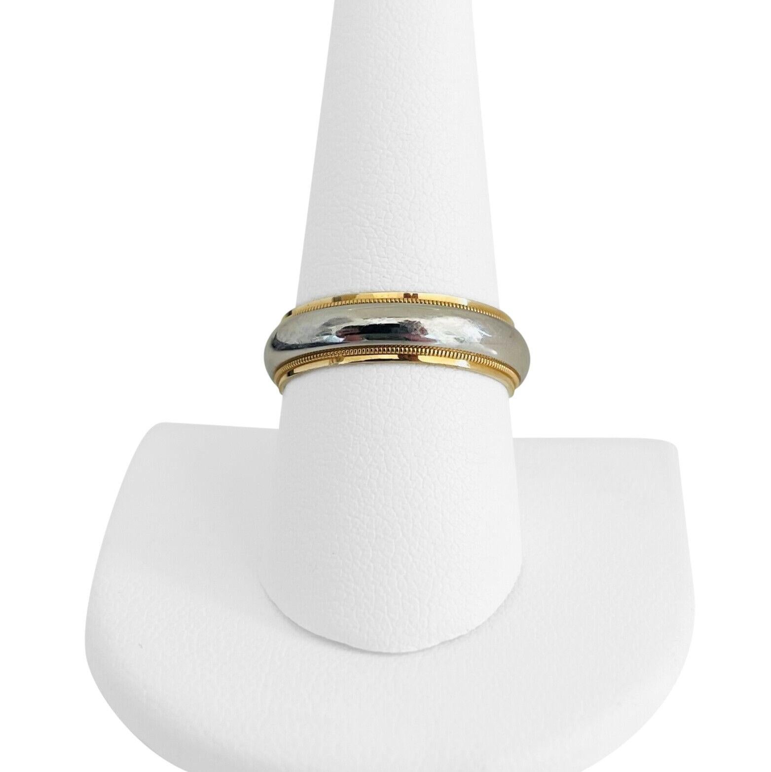 Tiffany & Co. 18k Yellow Gold & Platinum 6mm Wedding Band Ring Size 9.5 with Box

Condition:  Excellent Condition, Professionally Cleaned and Polished
Metal:  18k Gold and Platinum 950 (Marked, and Professionally Tested)
Weight:  10.7g
Width: 